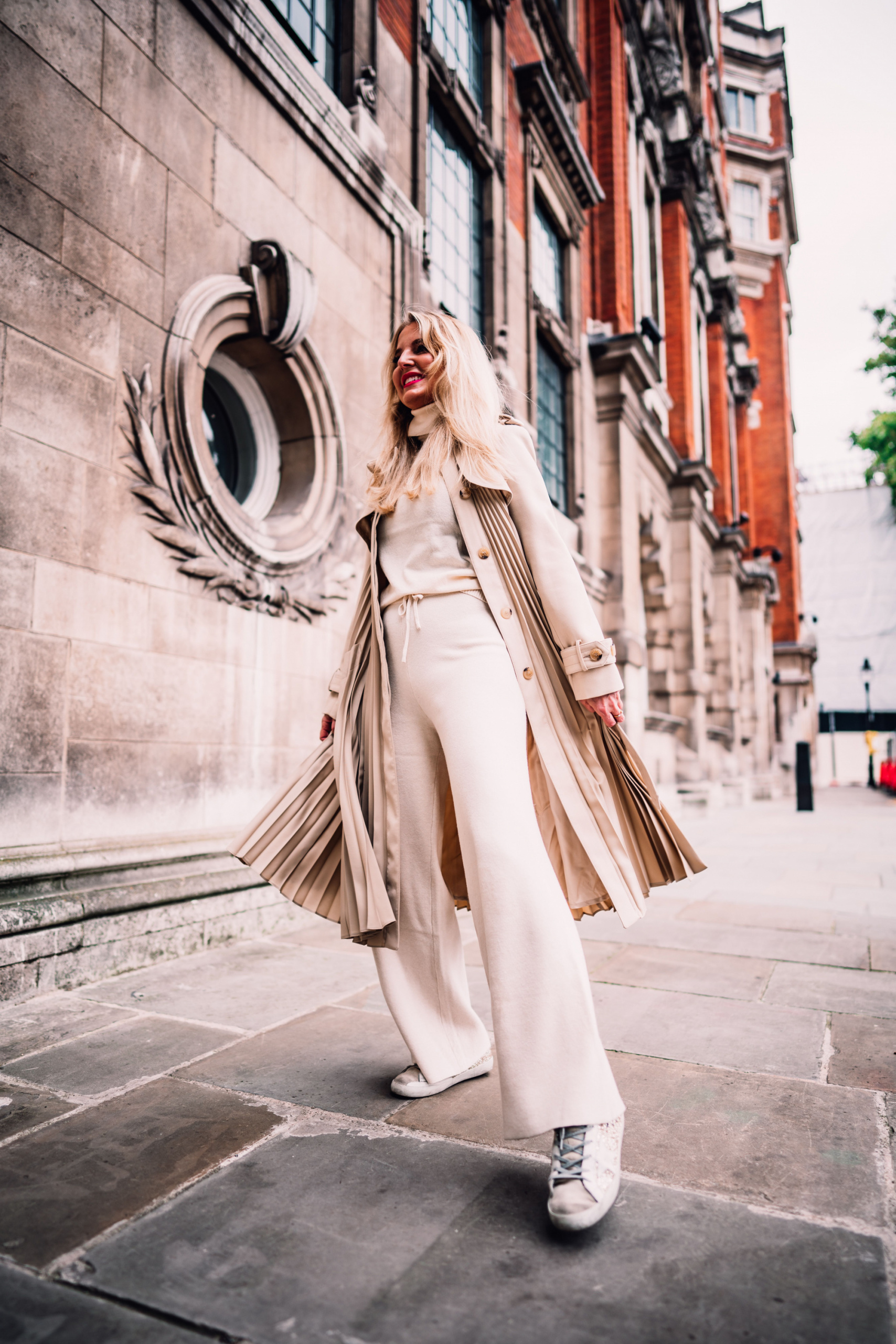 Sandro trench, why a chic trench coat belongs in every woman's closet, wardrobe basics, trench coats women over 40, trench coat outfits, erin busbee