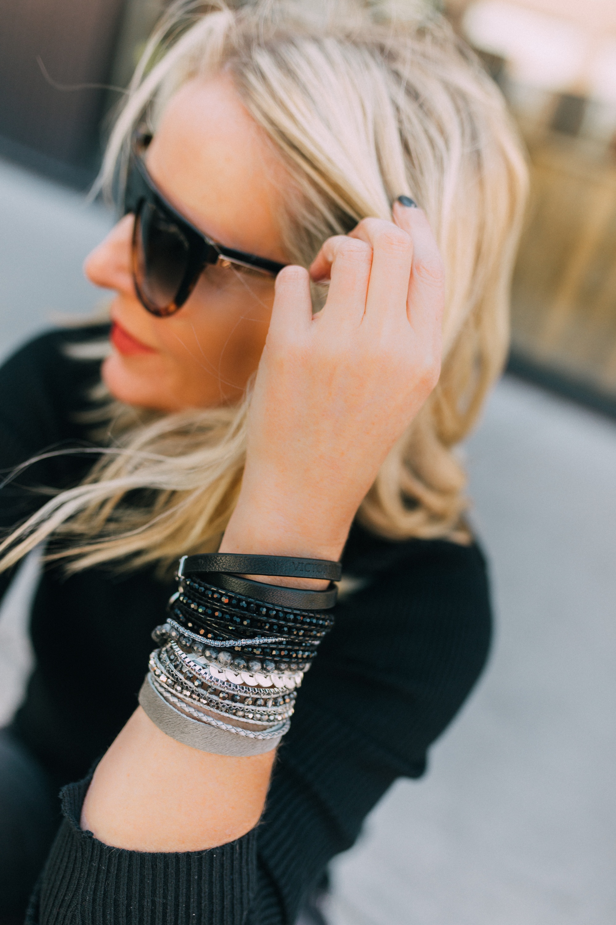 victoria emerson wrap bracelet stack arm candy with all black outfit