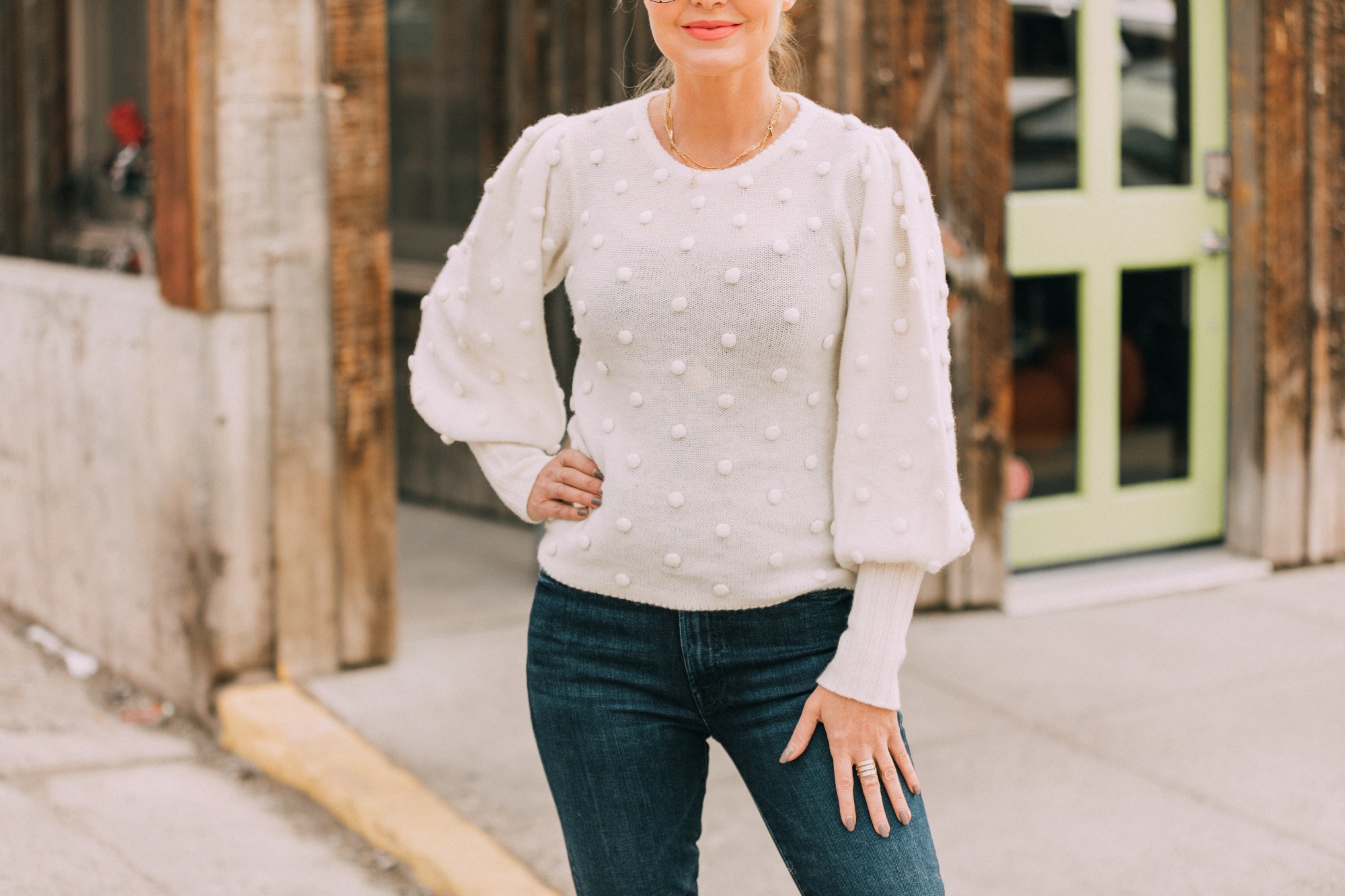 fashion blogger erin busbee wearing white balloon sleeve pom pom cashmere sweater other cashmere gifts