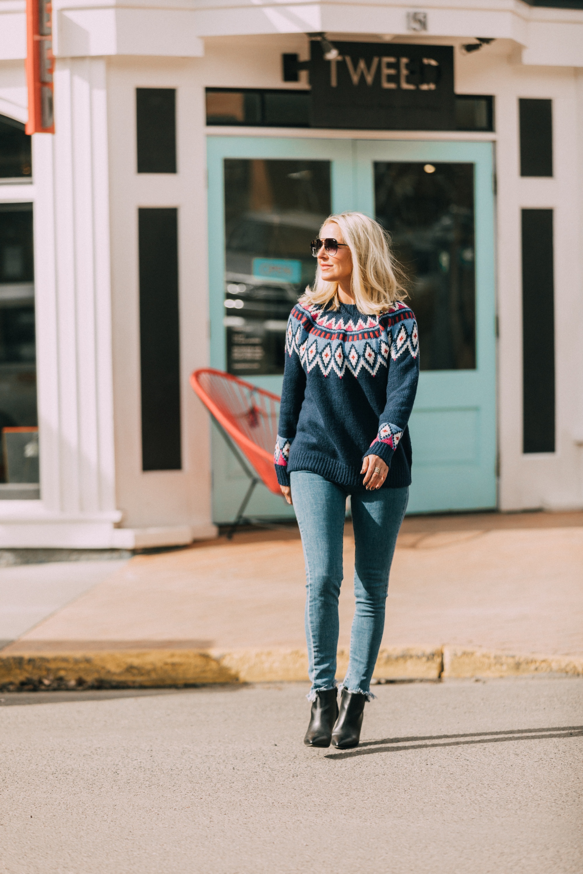 Affordable Sweaters, fashion blogger Erin Busbee of BusbeeStyle.com wearing a navy fair isle sweater, Levi's jeans, and black heeled booties from JCPenney in Telluride, C