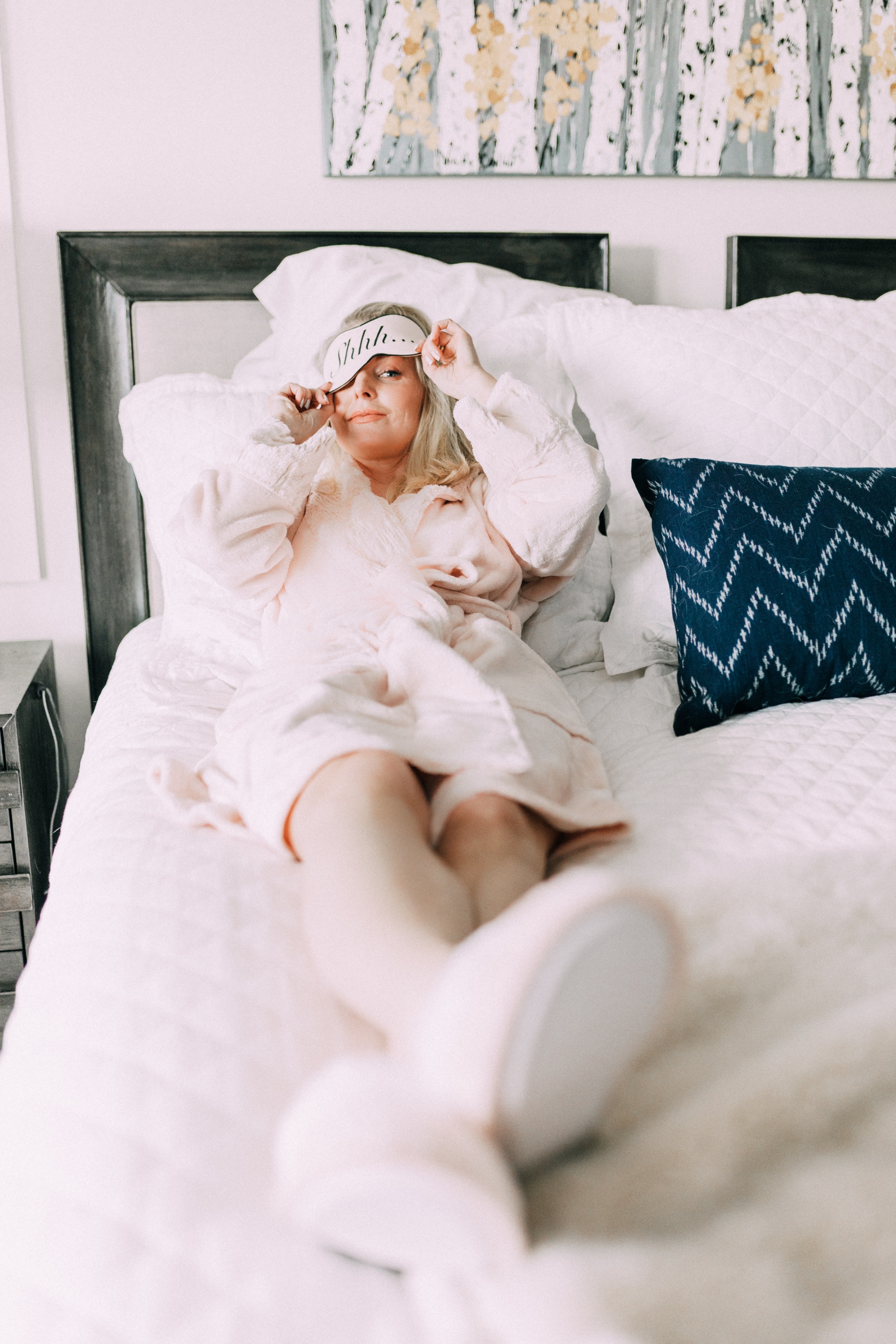 Loungewear Gifts, Fashion blogger Erin Busbee of BusbeeStyle.com wearing stripe tree pajama shorts, pink satin trip camisole, luxe sparkle robe, chenille slippers, fuzzy socks, and Cool Nights eye mask from Soma in Telluride, CO