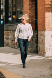 November Favorites, Fashion blogger Erin Busbee of BusbeeStyle.com wearing Frame high rise skinny jeans with a white pom pom balloon sleeve sweater by AQUA and black booties in Telluride, CO