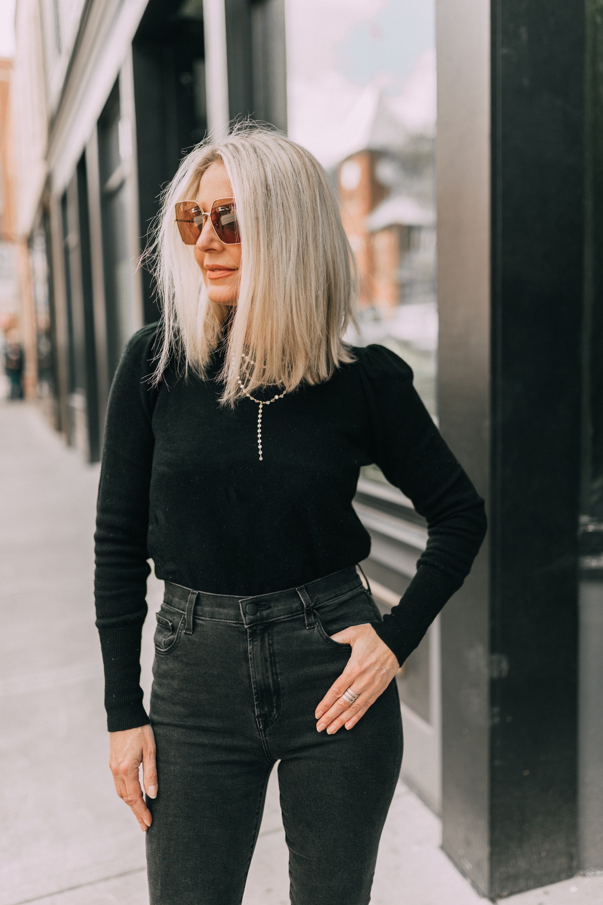 November Favorites, Fashion blogger Erin Busbee of BusbeeStyle.com wearing a black cashmere puff sleeve sweater from Bloomingdale's with black skinny jeans and a layered Baublebar necklace in Telluride, CO