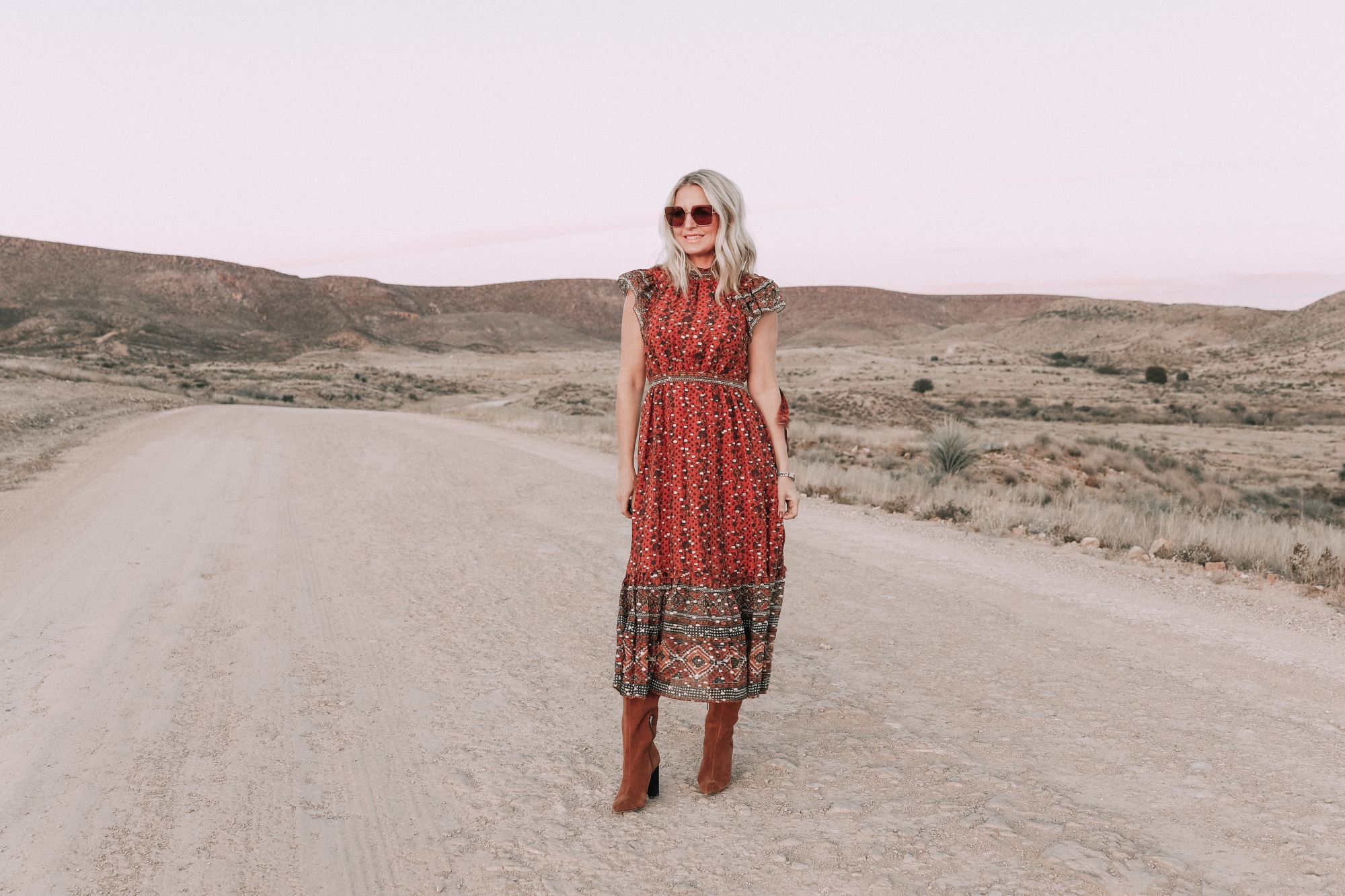 Ulla Johnson Alastair red maxi dress worn with brown suede boots outfit fashion blogger over 40 Busbee Style Cibolo Creek Ranch Texas