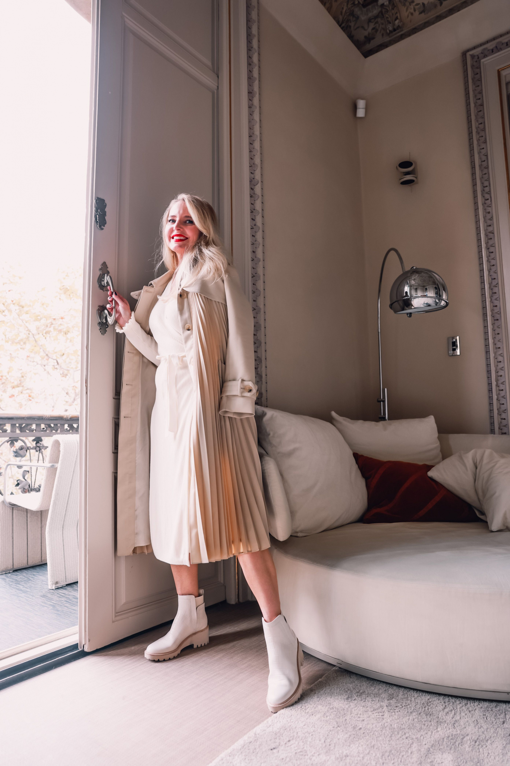 winter neutrals, winter white outfits, winter outfits, neutral outfits, neutral looks, ribbed wrap dress, white winter-dress, other stories ribbed wrap midi dress, steve madden wedge chelsea boots, sandro pleated trench coat, erin busbee, el palauet, barcelona, spain