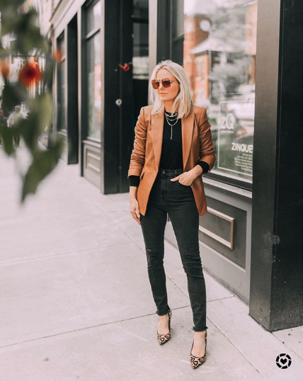 january top instagram post featuring fashion blogger erin busbee wearing black jeans black t shirt with brown leather blazer