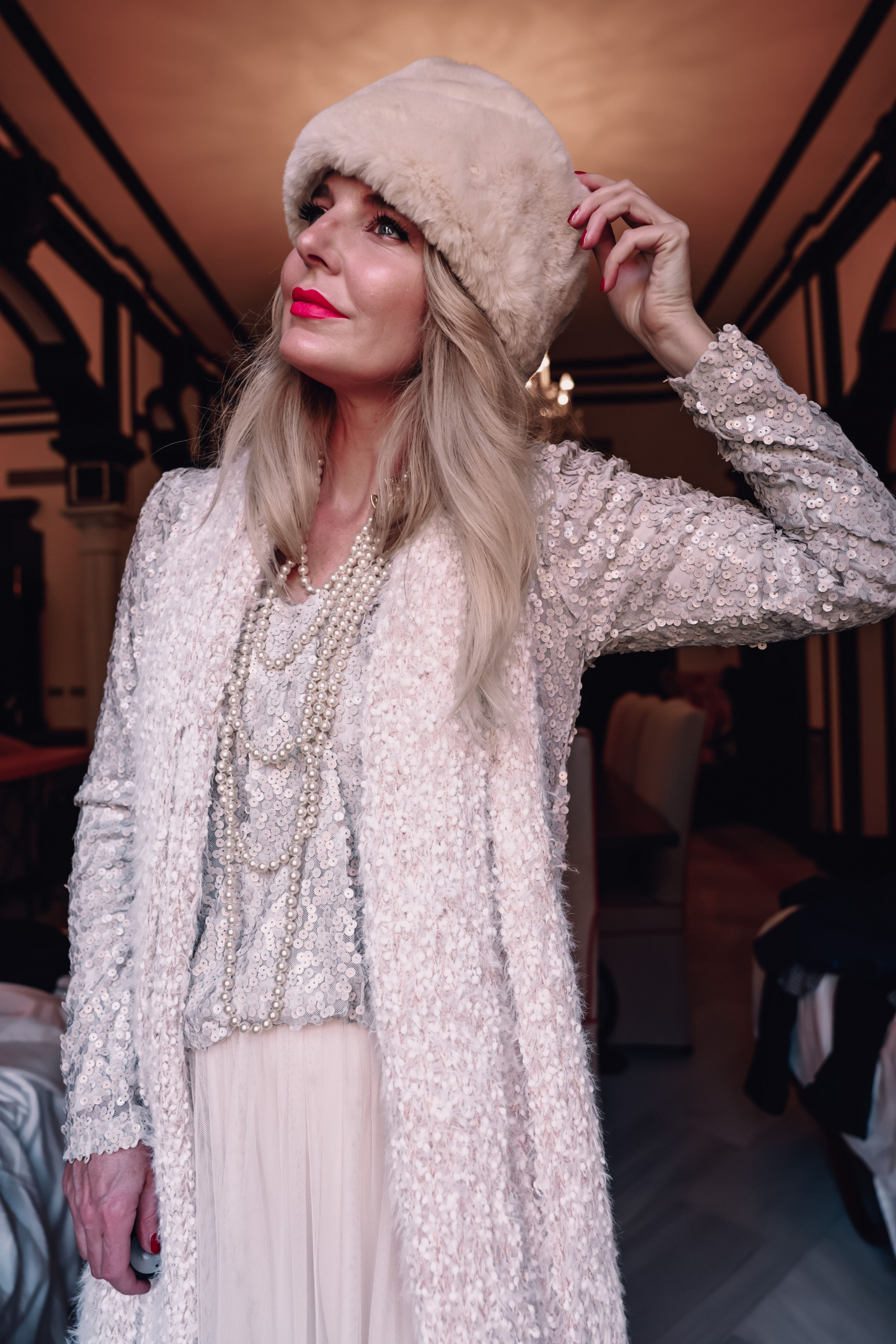 winter accessories faux fur scarf, white faux fur Russian hat, Erin Busbee fashion blogger over 40, Sevilla, Spain, cold weather accessories