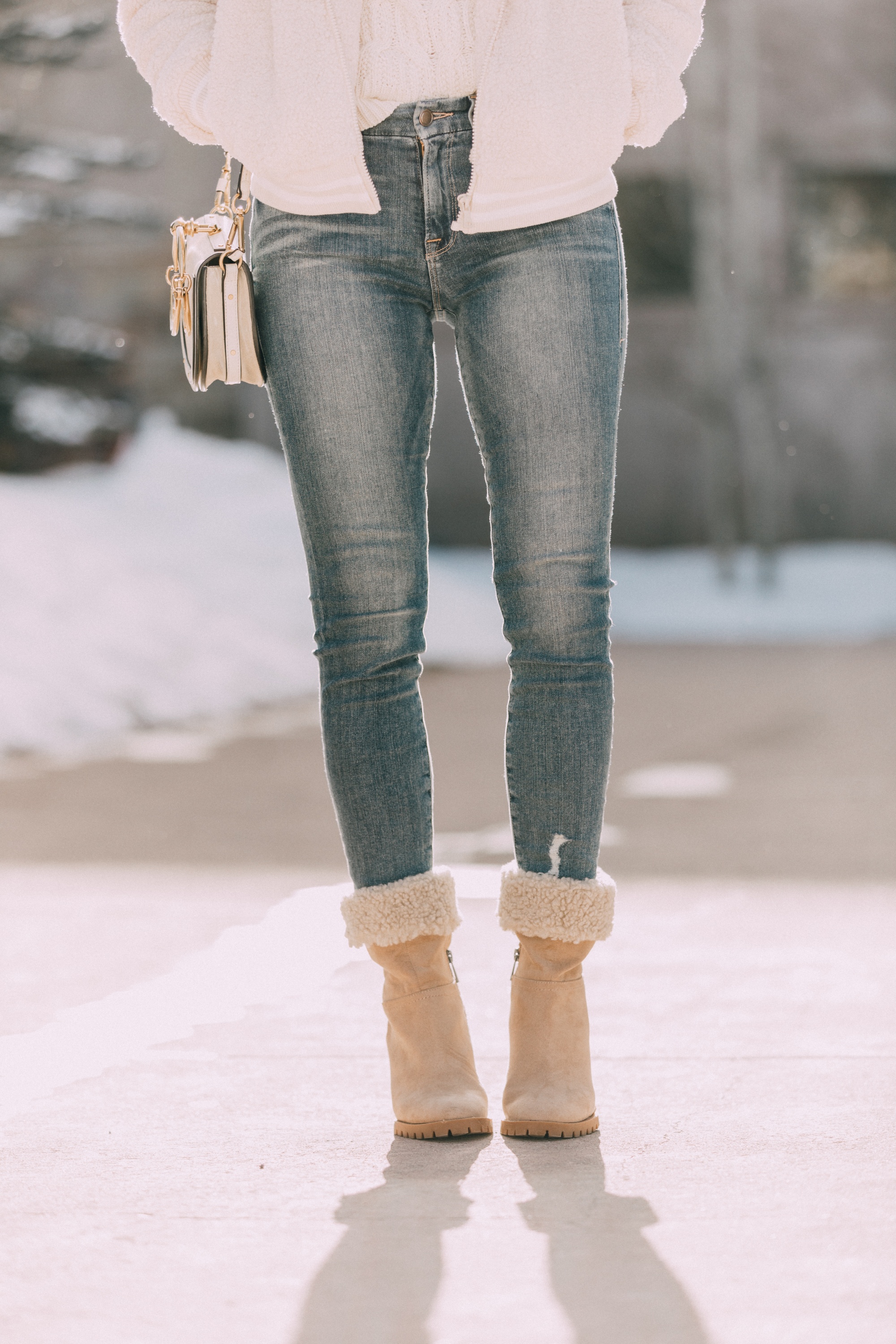 walmart fashion blogger outfit faux shearling foldover boots faux fur teddy Scoop jacket, white Scoop cable knit sweater, medium wash skinny jeans in Telluride, Colorado