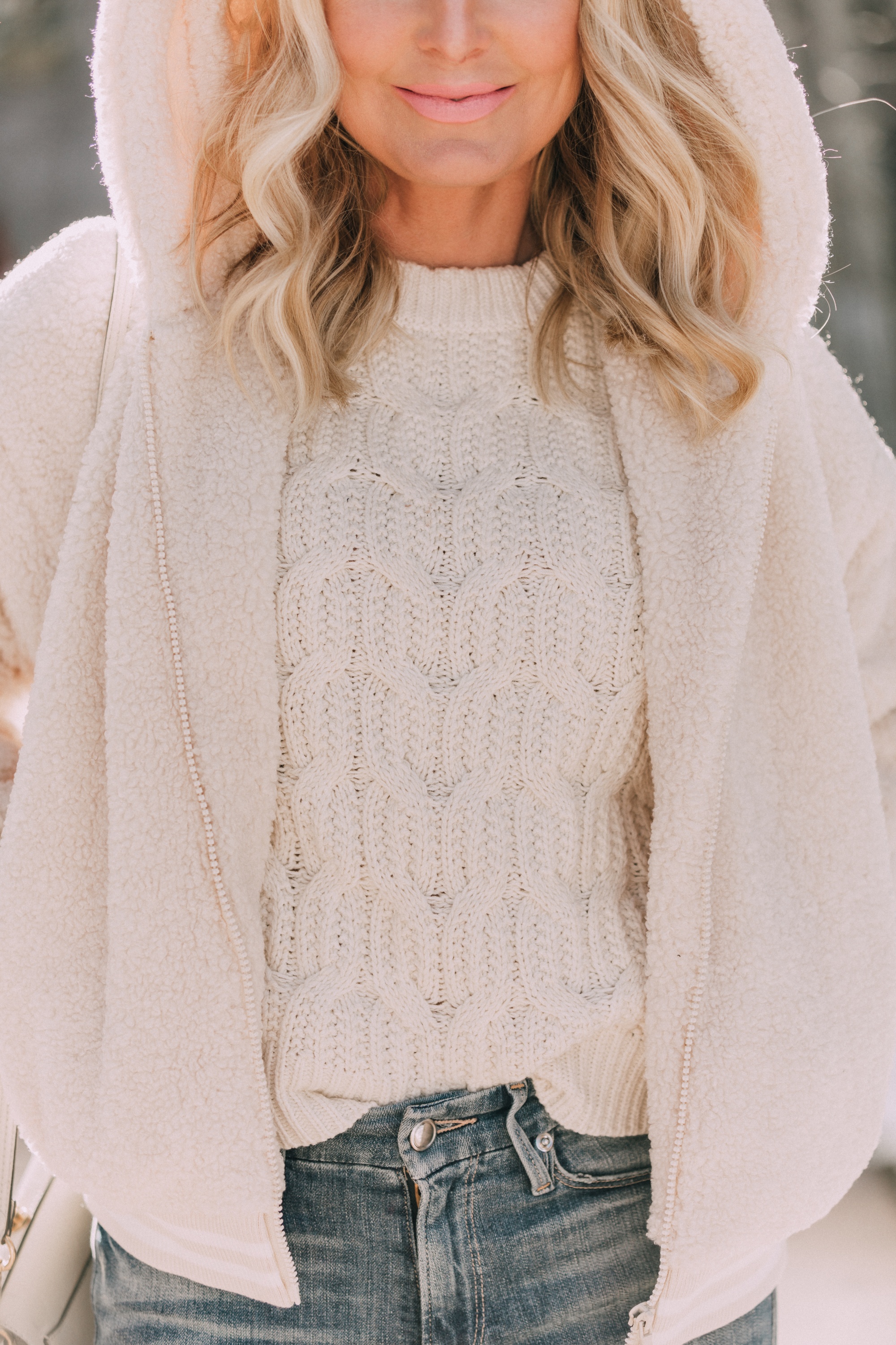 walmart fashion blogger wearing cozy faux fur teddy Scoop jacket, white Scoop cable knit sweater, medium wash skinny jeans
