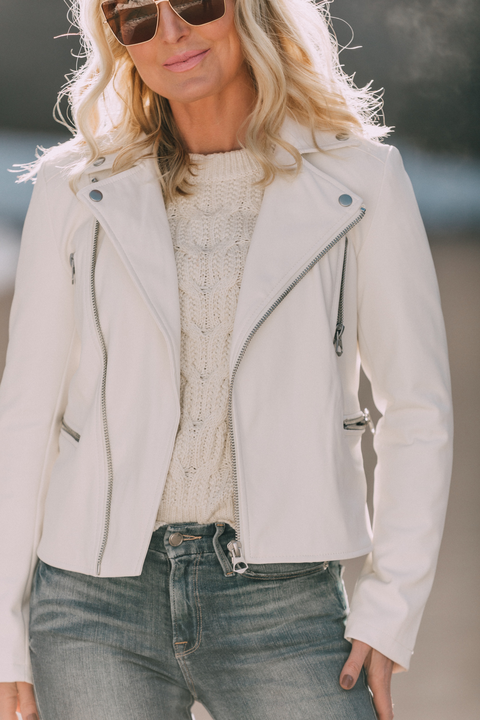 Winter White pieces from walmart by Scoop on Fashion blogger Erin Busbee of BusbeeStyle.com wearing a white faux leather moto jacket by Scoop in Telluride, Colorado
