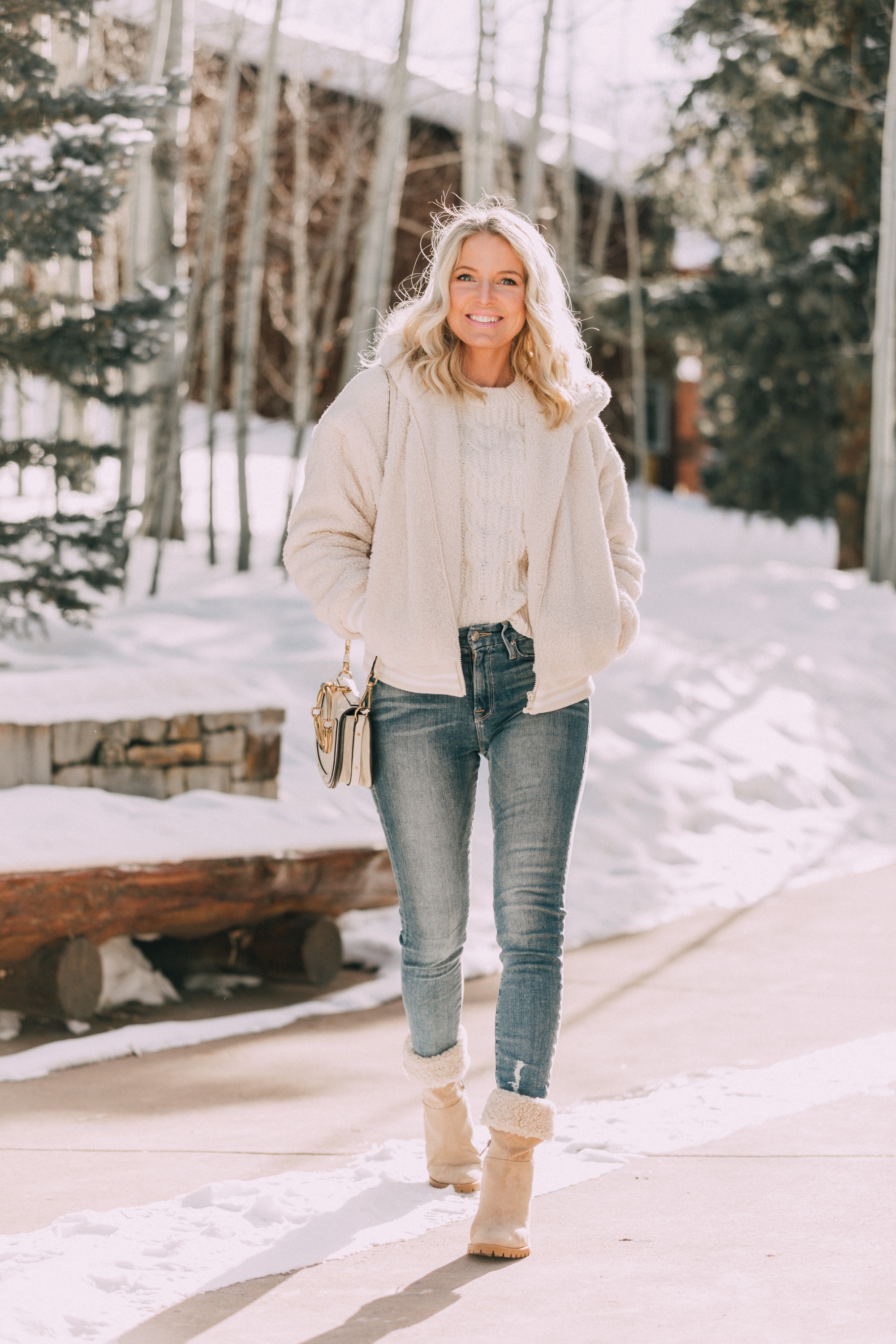 walmart fashion faux fur teddy Scoop jacket, white Scoop cable knit sweater, medium wash skinny jeans, faux shearling foldover boots from Walmart in Telluride, Colorado