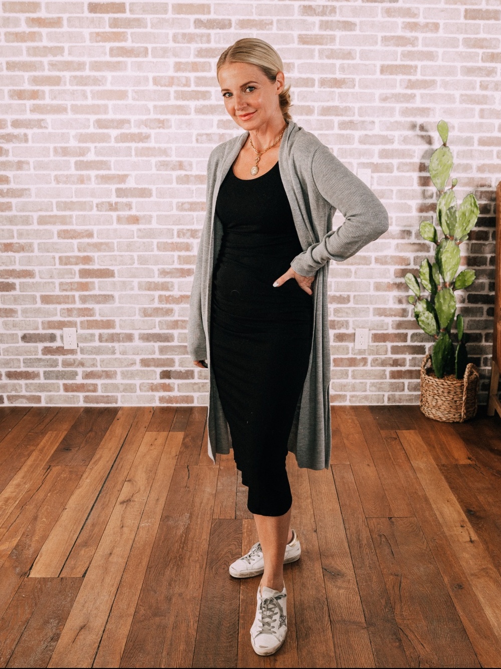 Stylish Work From Home Outfits, Fashion blogger BusbeeStyle wearing black tank dress with long cardigan and golden goose sneakers in Telluride, Colorado