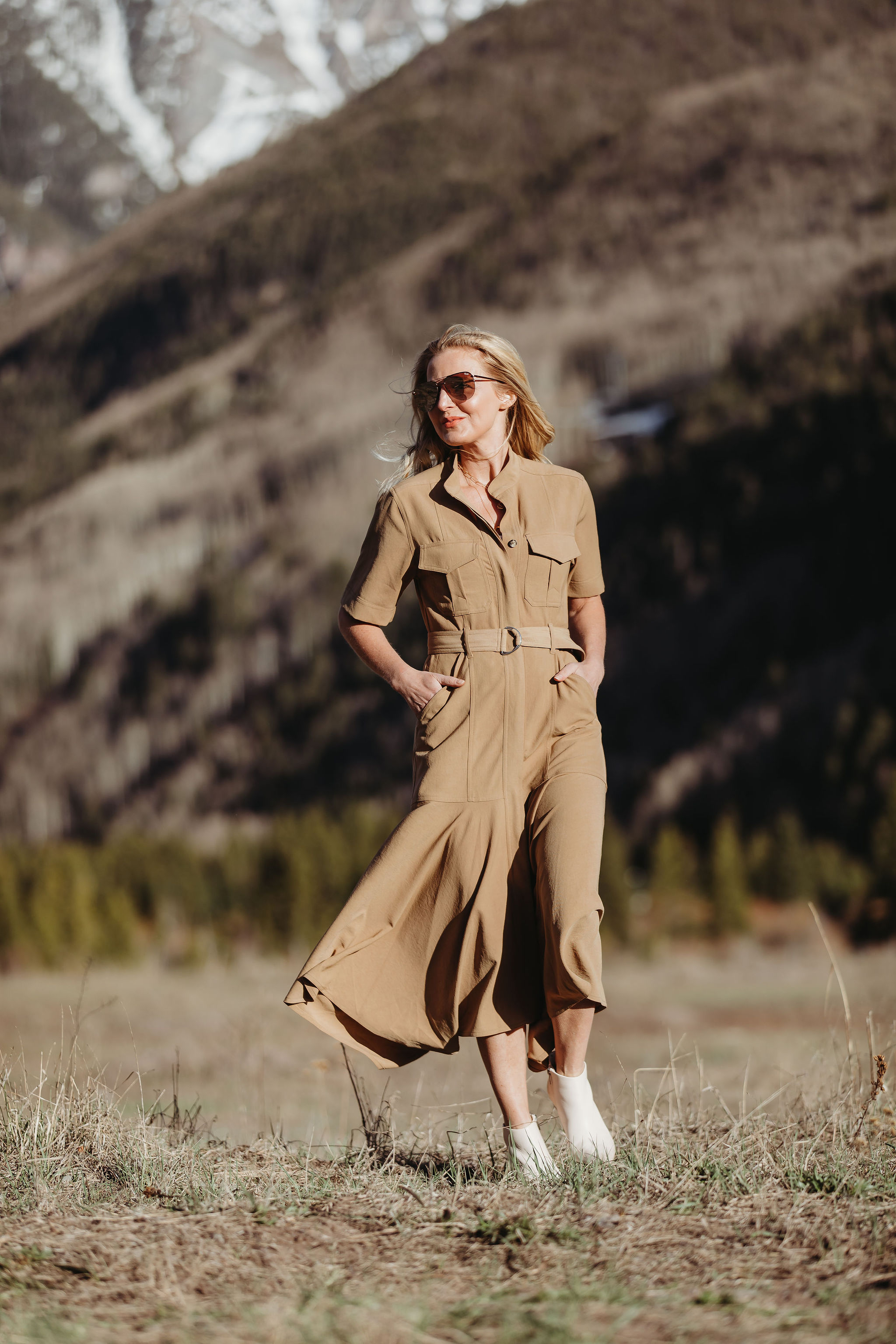 Africa Outfits, fashion blogger wearing tan belted ALC shirtdress with white booties in Telluride, Colorado
