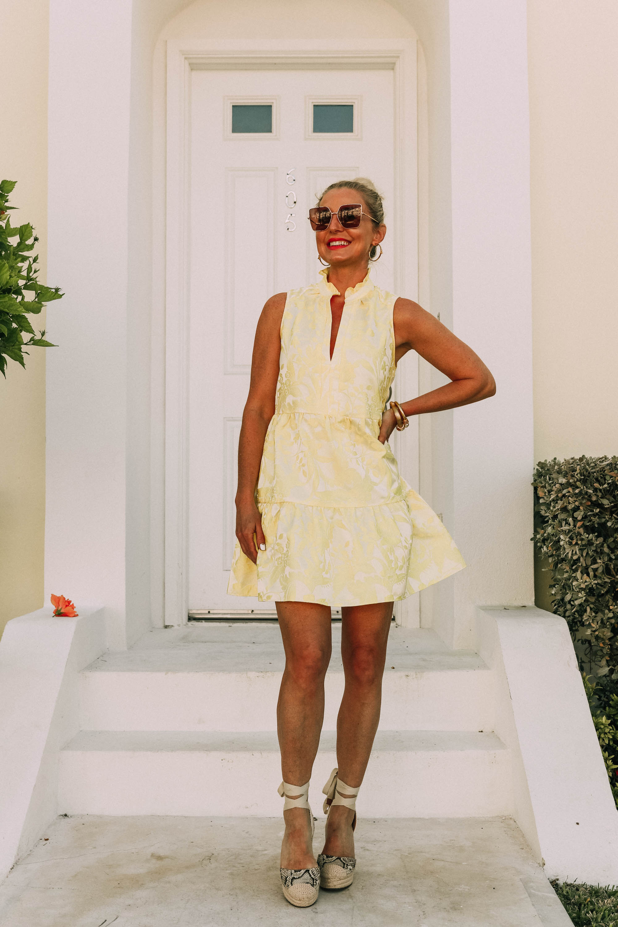 Pastels For Summer, Fashion blogger Erin Busbee of BusbeeStyle.com wearing a yellow dress by Amanda Uprichard with Vince Camuto espadrille wedges in the Bahamas