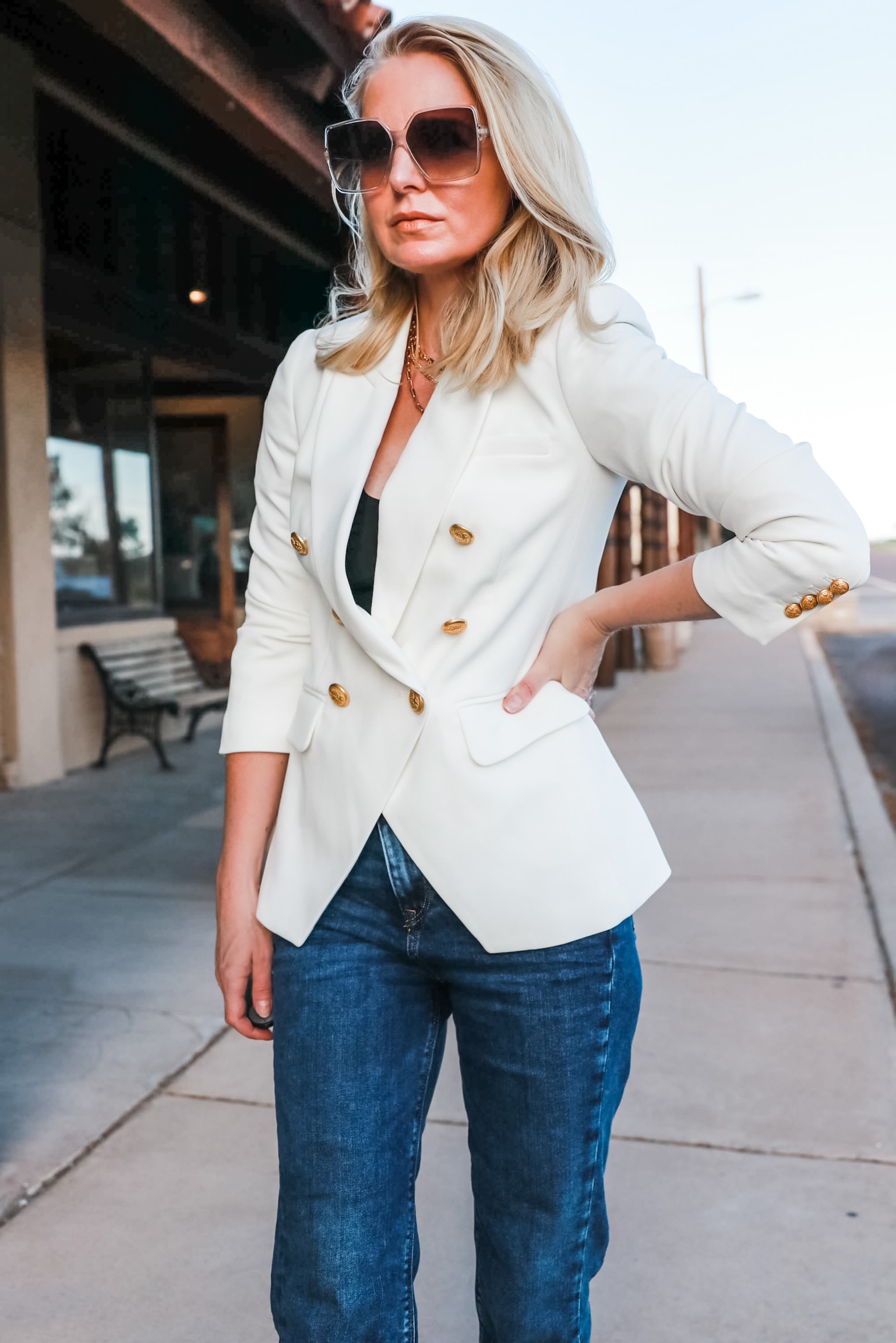womens white double breasted blazer with gold buttons fashion blogger outfit with blue jeans gold chain link necklaces