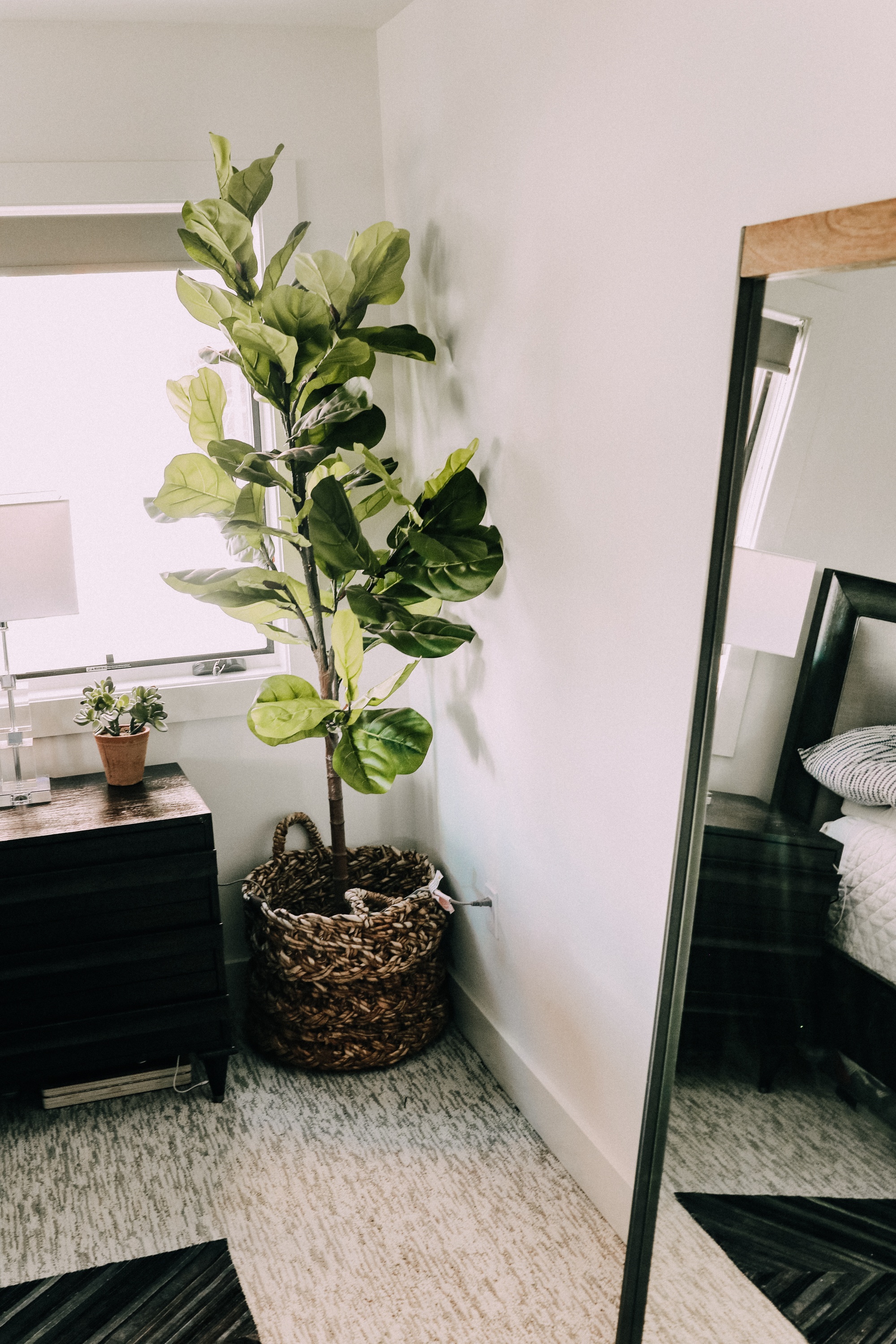 best artificial indoor plants, faux fiddle leaf fig tree in woven basket