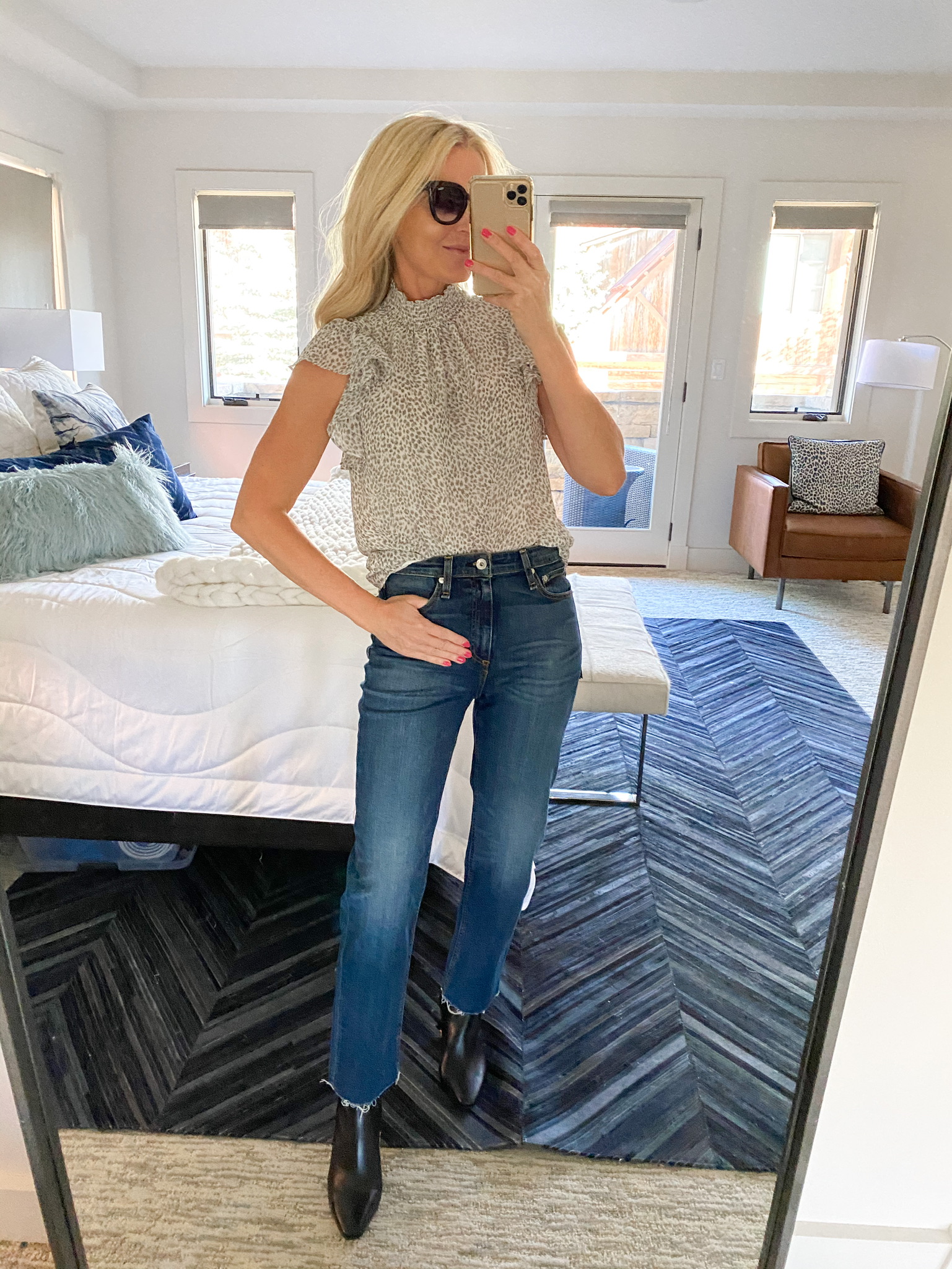 Nordstrom Sale Outfits, Fashion Blogger Erin Busbee Of Busbee Style Wearing A Leopard Print Flutter Sleeve Top By 1.State With Rag &Amp; Bone Straight Leg Jeans And Black Louise Et Cie Booties In Telluride, Colorado
