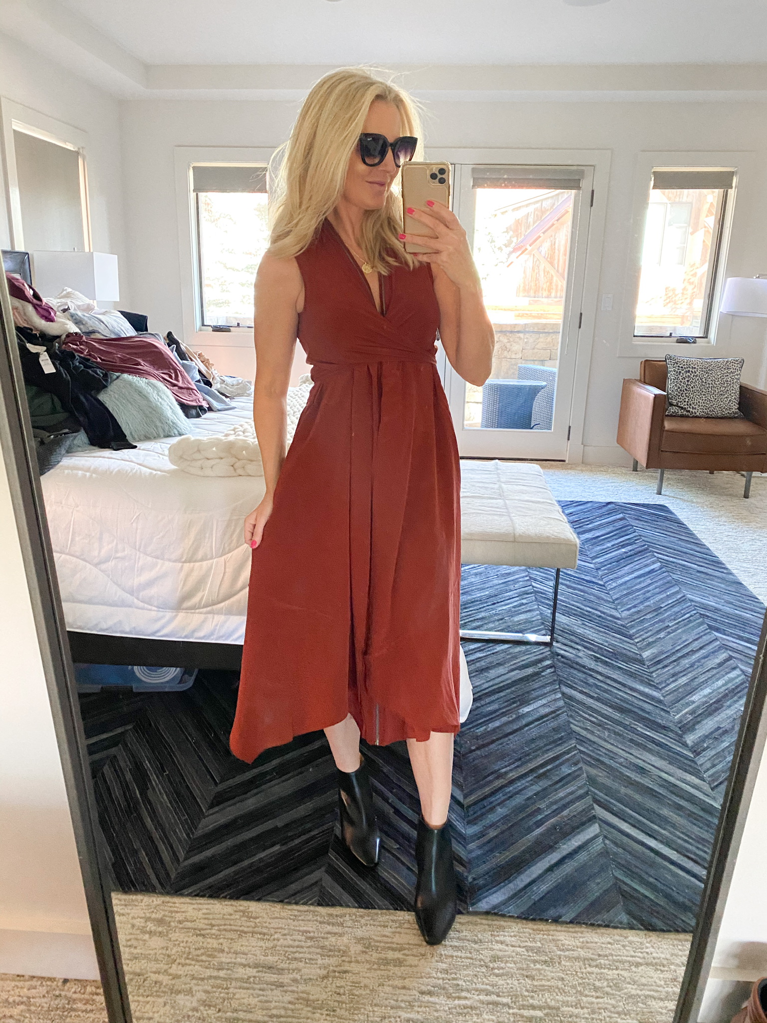 Nordstrom Sale Favorites, Fashion Blogger Erin Busbee Of Busbee Style Wearing A Rust Red Colored Zip Front Dress By Allsaints With Black Booties In Telluride, Colorado
