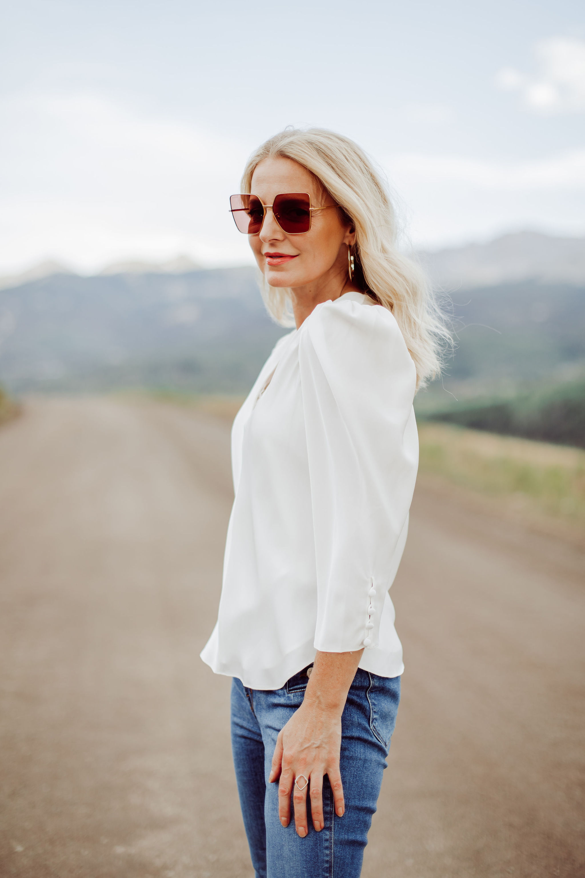 Frame Blouses, Fashion blogger Busbee Style wearing white Frame puff sleeve blouse, J Brand Natasha blue jeans in Telluride, Colorado