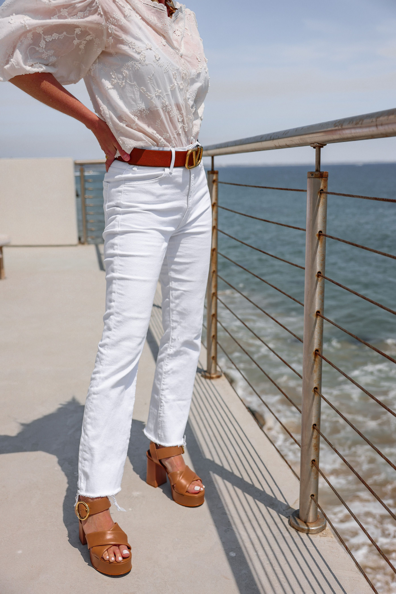How to wear white jeans, high waisted white jeans, how to wear white jeans in summer, white jeans for women, what to wear with white jeans, erin busbee, busbee style, fashion over 40, malibu, california, white maje coiso embroidered cotton blouse, white mother hustler jeans, see by chloe platform heels, saint laurent square sunglasses, paco rabbane chunky gold necklace, dean davidson hoops