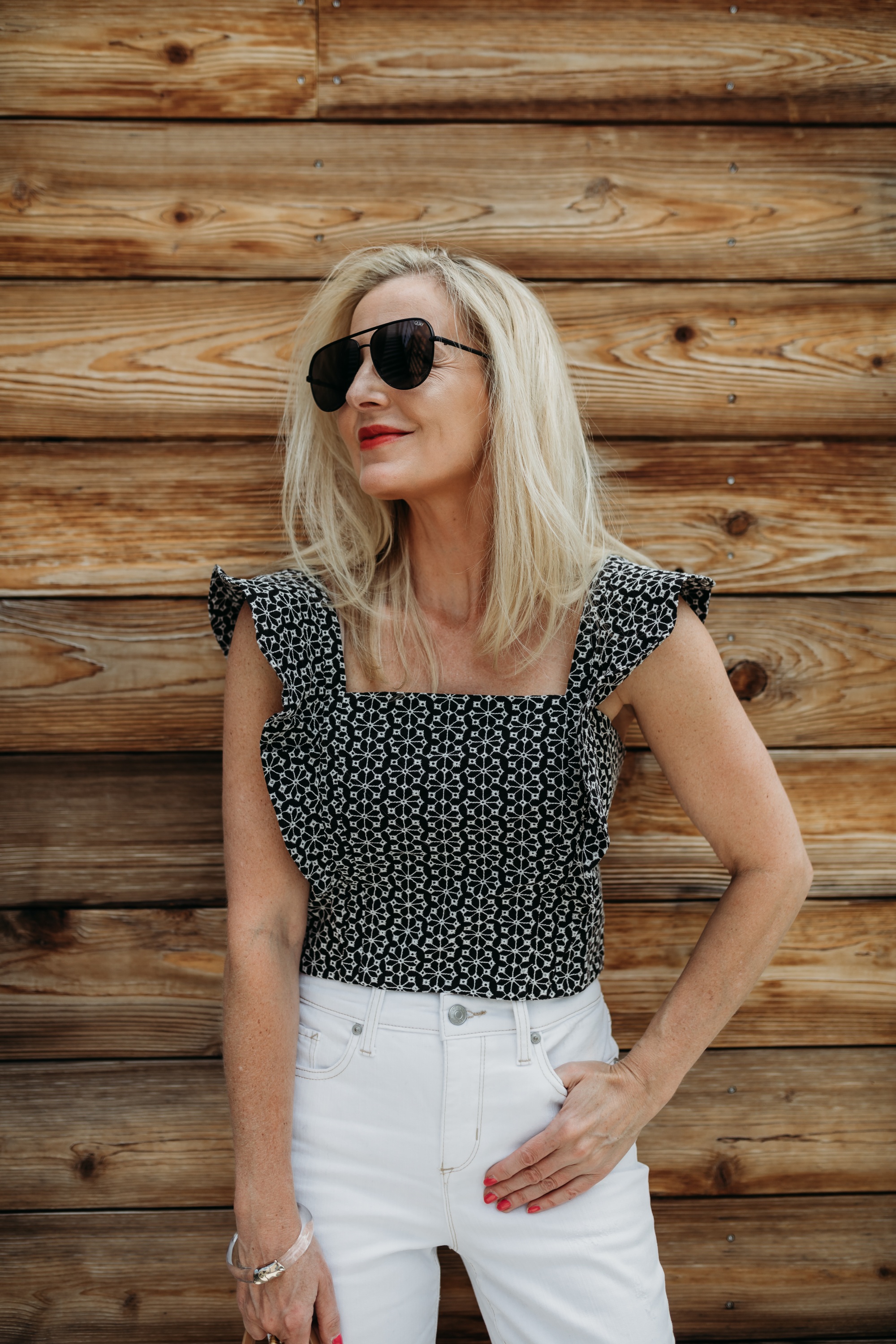 fashion blogger over 40 showing how to style a crop top over age 40 in age appropriate outfit