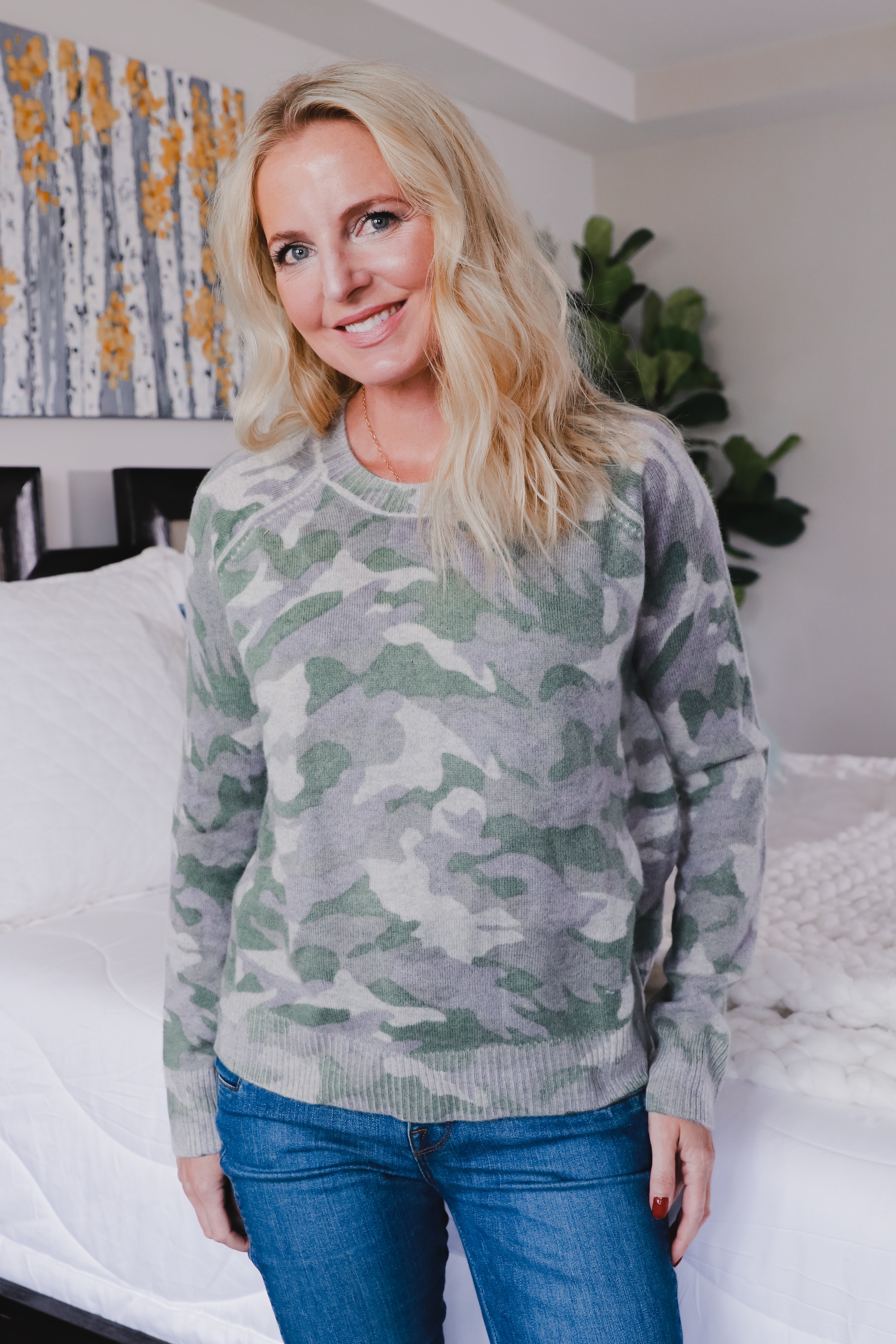 coziest fall sweaters, cozy fall sweaters, fall sweaters, womens fall sweater,Aqua Cashmere Sweater, Erin Busbee of Busbee Style wearing a green camo cashmere sweater by Aqua from Bloomingdale's untucked from her J Brand Natasha jeans in Telluride, Colorado