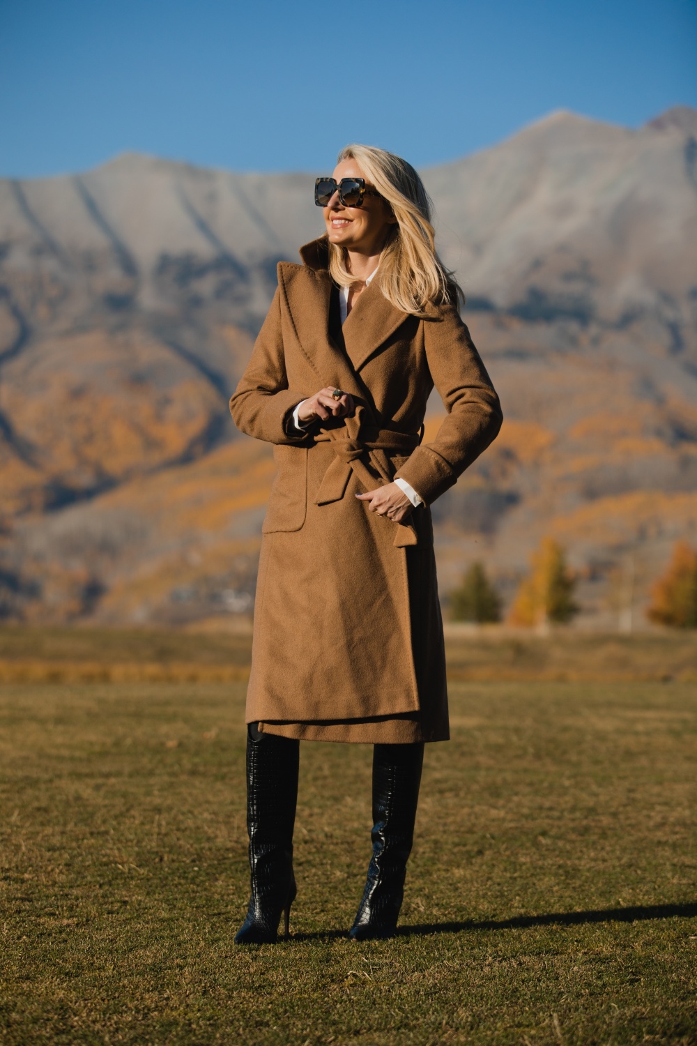 Perfect Camel Coat, Erin Busbee of Busbee Style wearing a Ralph Lauren camel wool wrap coat over a brown brochu walker layered sweater, spanc faux leather leggings, and shutz black croc embossed leggings in Telluride, Colorado