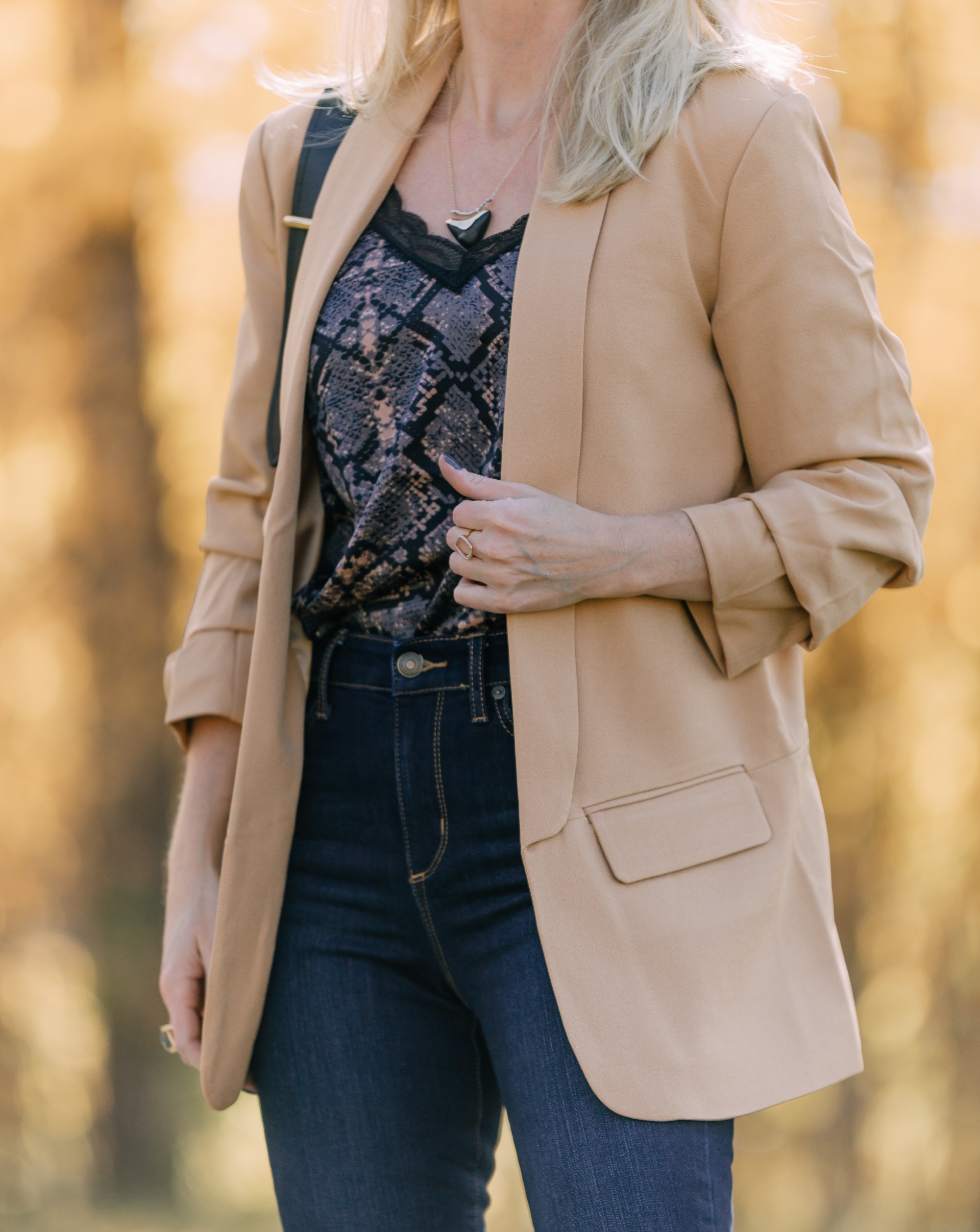 Affordable Fall Fashion, Erin Busbee of Busbee Style wearing dark wash skinny jeans by Scoop, a camel boyfriend blazer by Scoop, a black lacy python print camisole by Scoop, black scrunch stiletto booties by Scoop, Prada Cahier black and brown bag, and Salvatore Ferragamo sunglasses in Telluride, Colorado