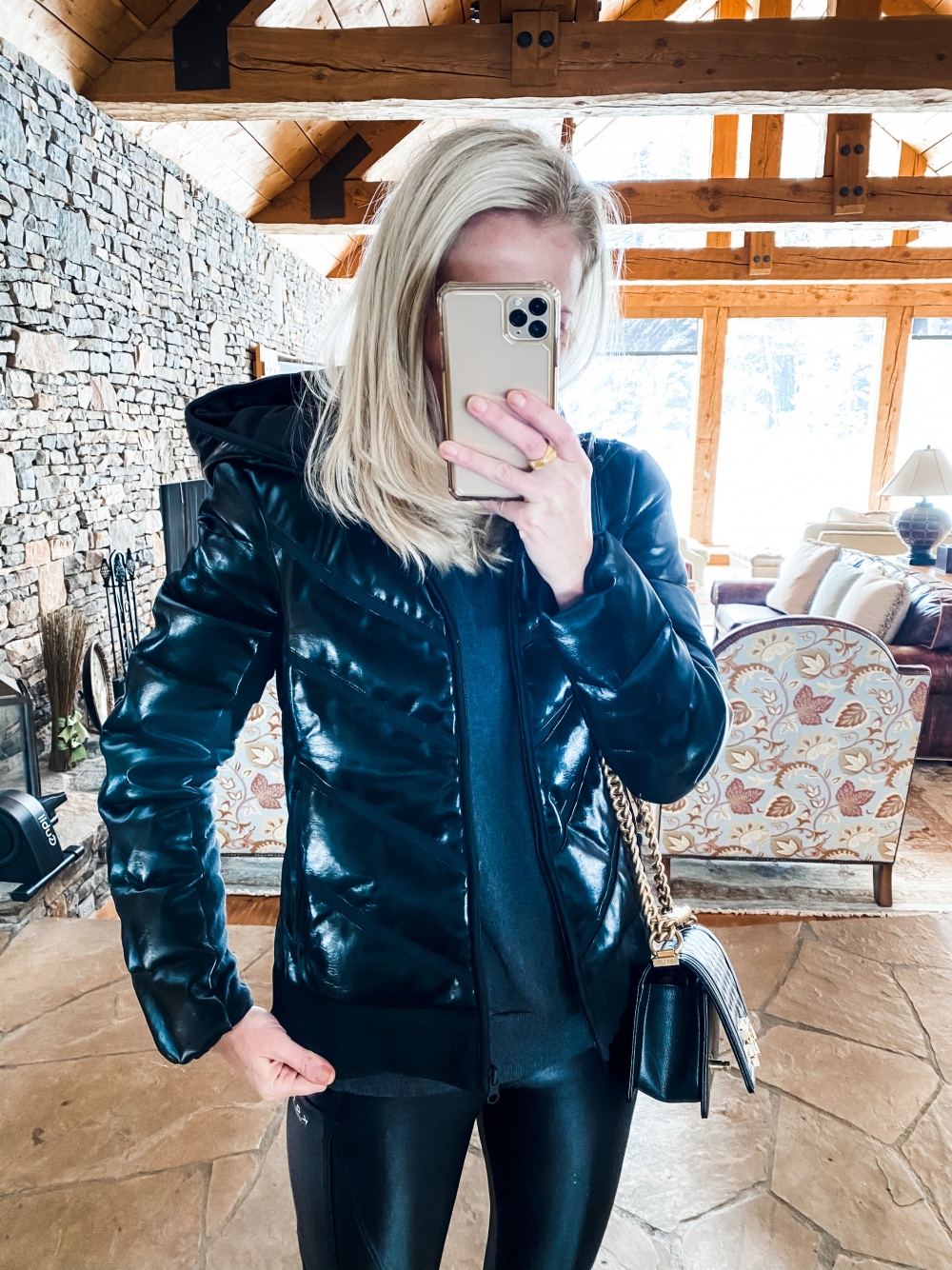 BEST winter coats and jackets featuring a Blanc Noir puffer jacket with mesh panels in black on fashion over 40 blogger Erin Busbee