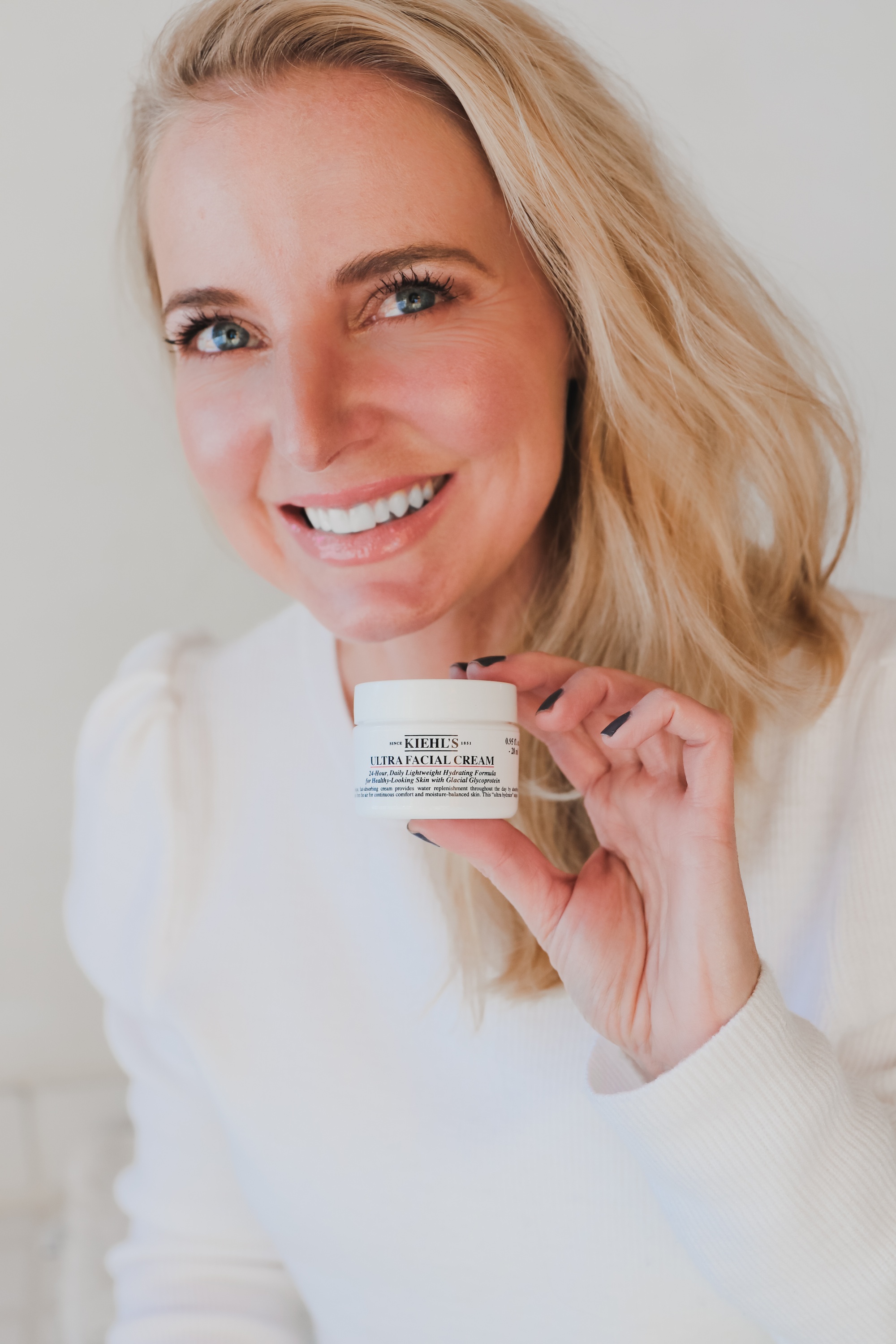 Skincare Gifts, Erin Busbee of Busbee Style using theUUltra Facial Cream by Kiehl' in Telluride, Colorado
