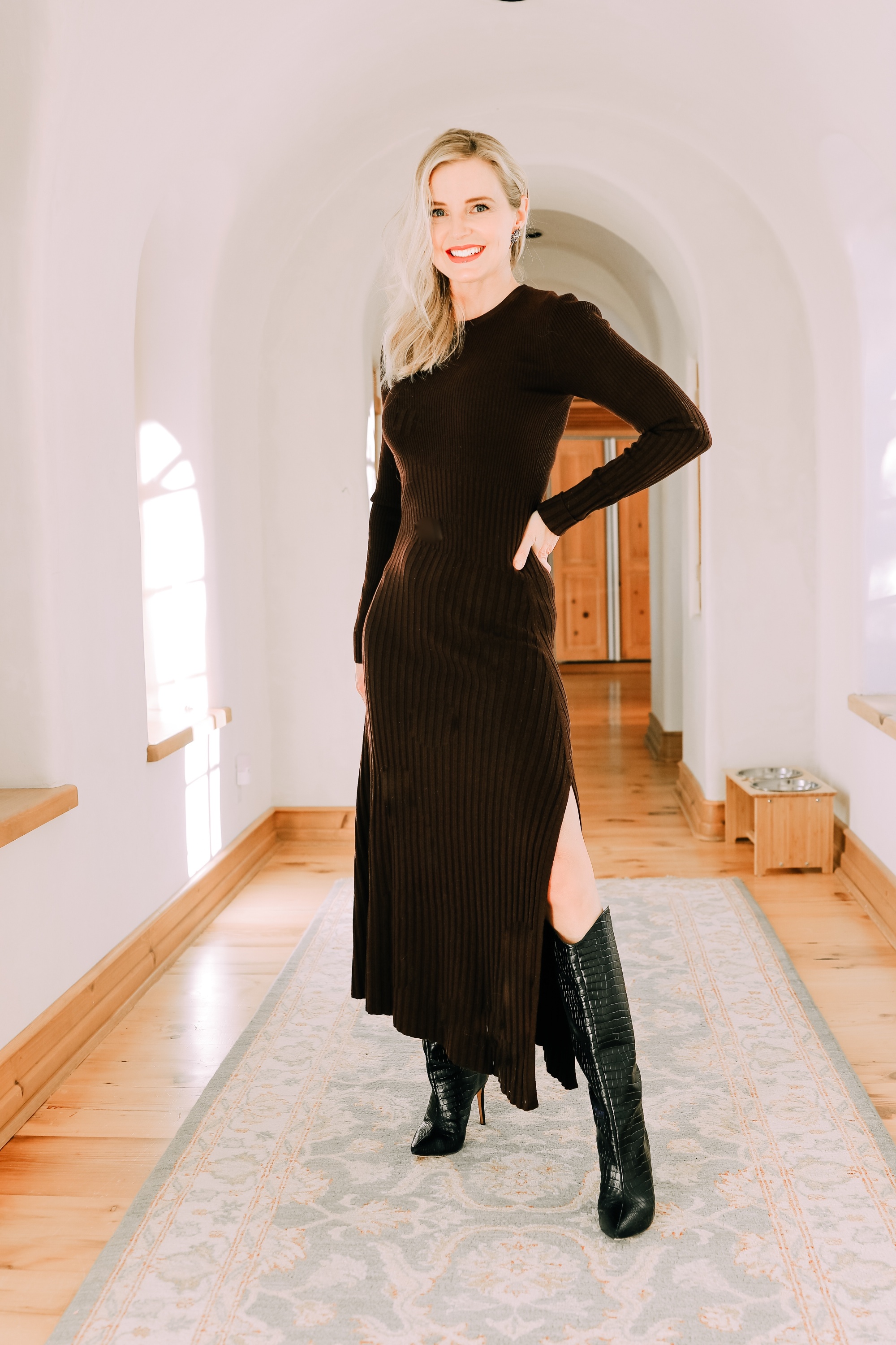 Holiday Outfit ideas that are comfy and warm featuring dark brown ALC sweater dress with Schutz black croc-embossed boots on fashion over 40 Blogger Erin Busbee