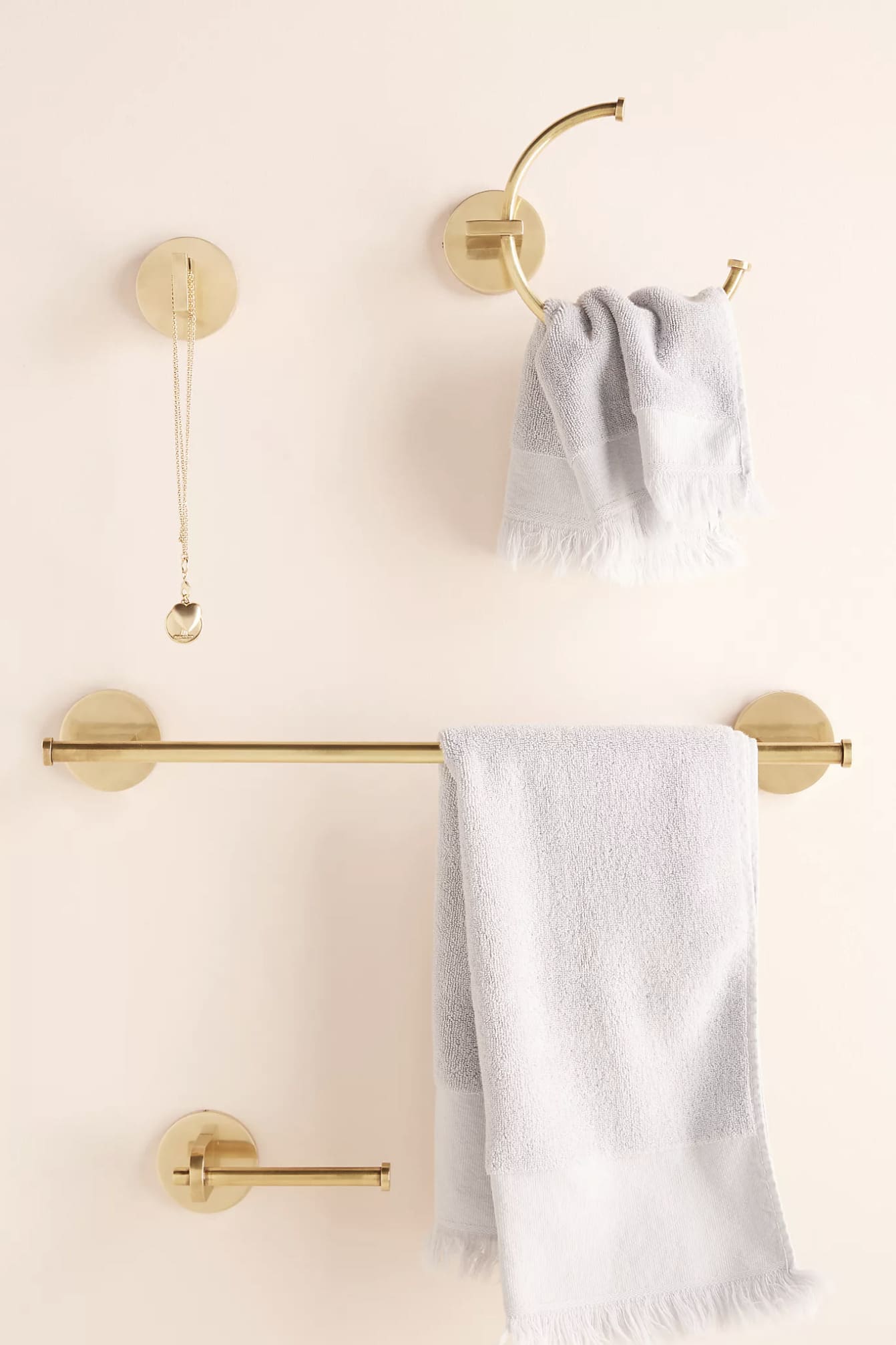 How To Update Your Powder Room With These 4 Easy Changes including new towel ring, bar and hook