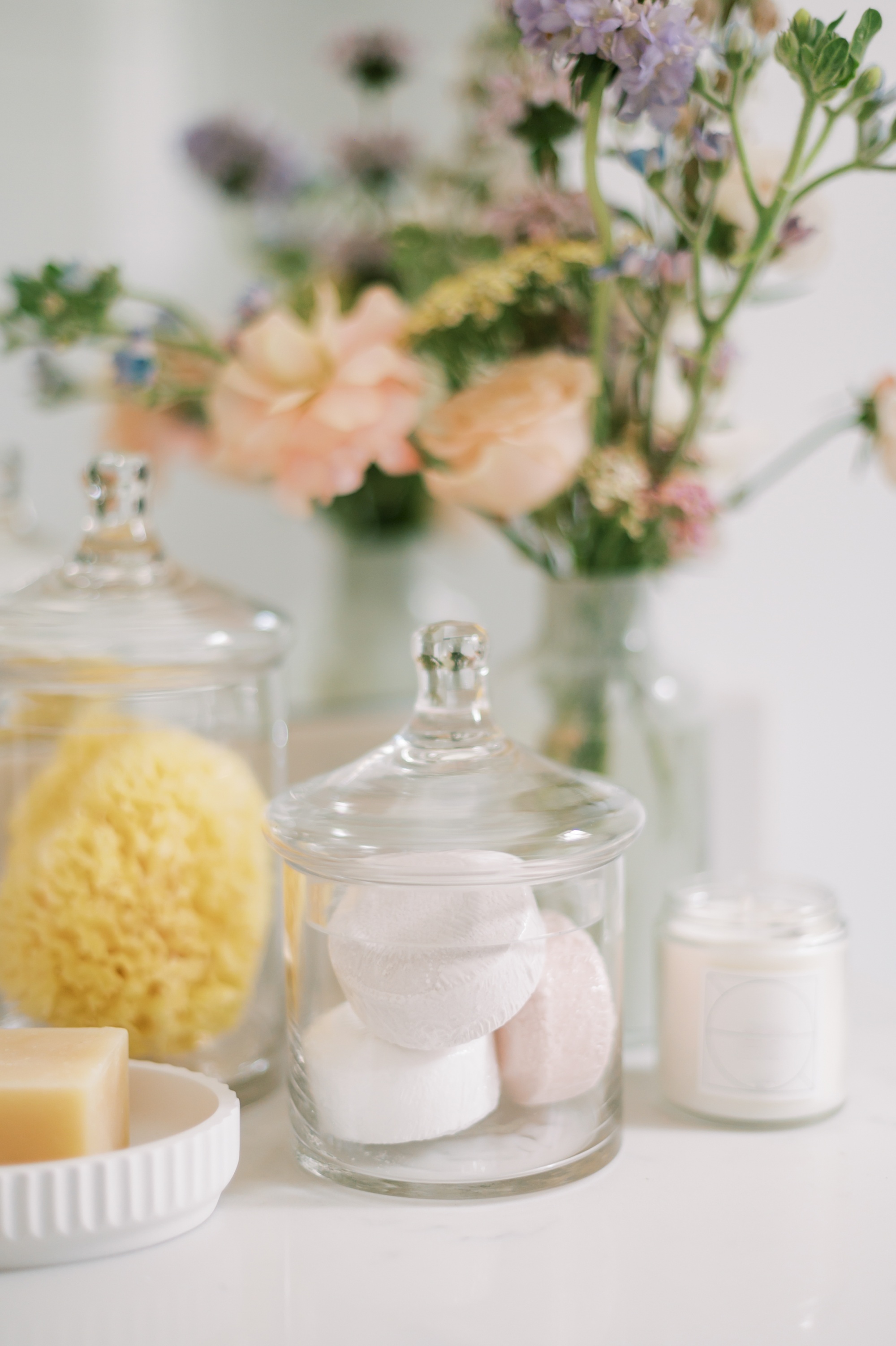How To Update Your Powder Room With These 4 Easy Changes including pretty soap holder and fresh flowers