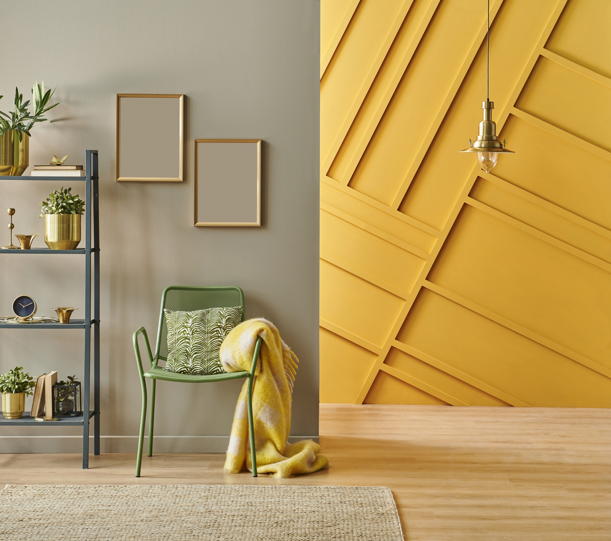 Revealing-Pantones-2021-colors-of-the-year-Illuminating-Yellow-and-Ultimate-Grey-highlighting-a-bright-yellow-wall-and-a-grey-accent-wall-green-chair-and-yellow-blanket