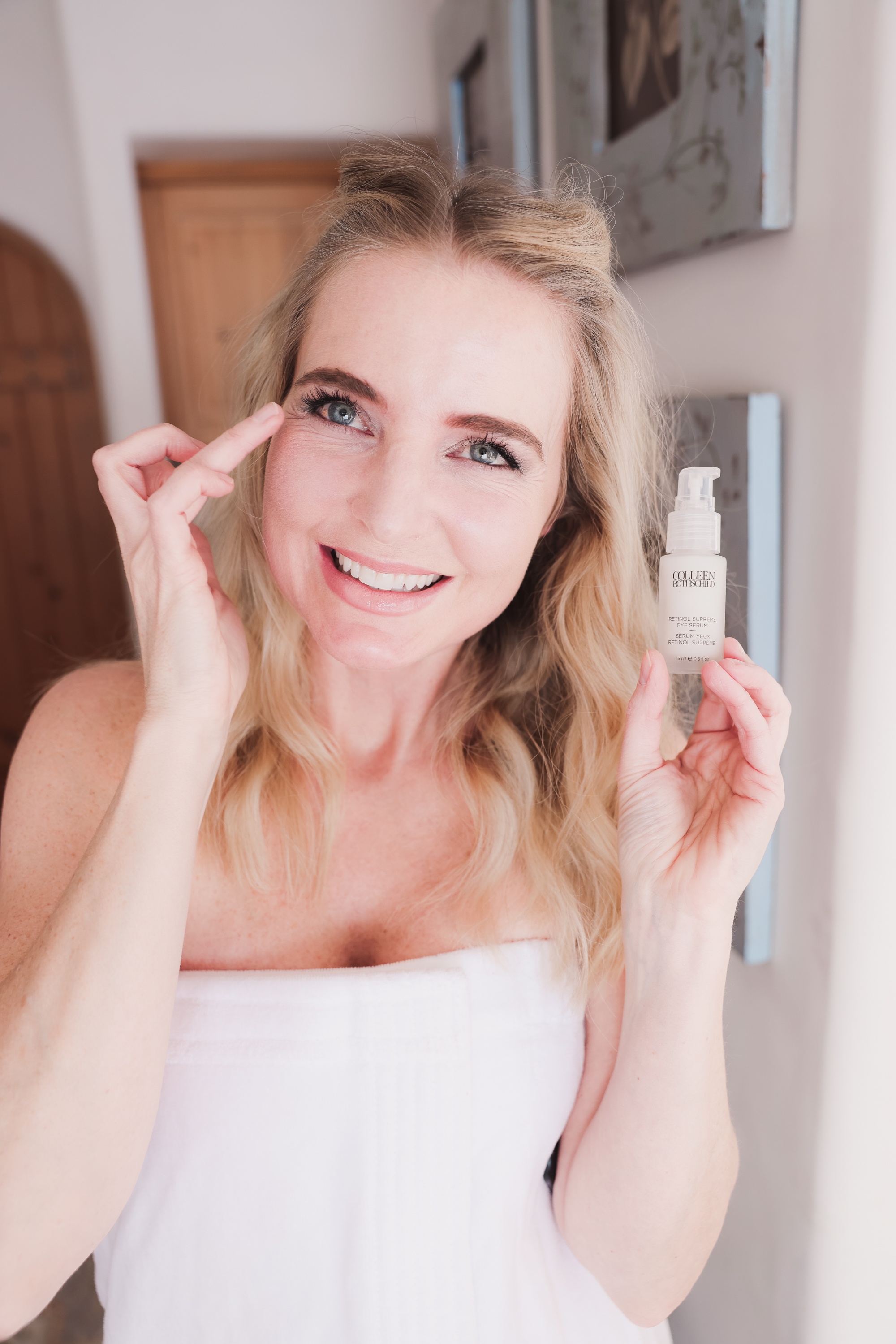 Best Skincare Over 40, Erin Busbee of Busbee using the Colleen Rothschild Retinol Supreme Eye Serum in her bathroom in Telluride, Colorado