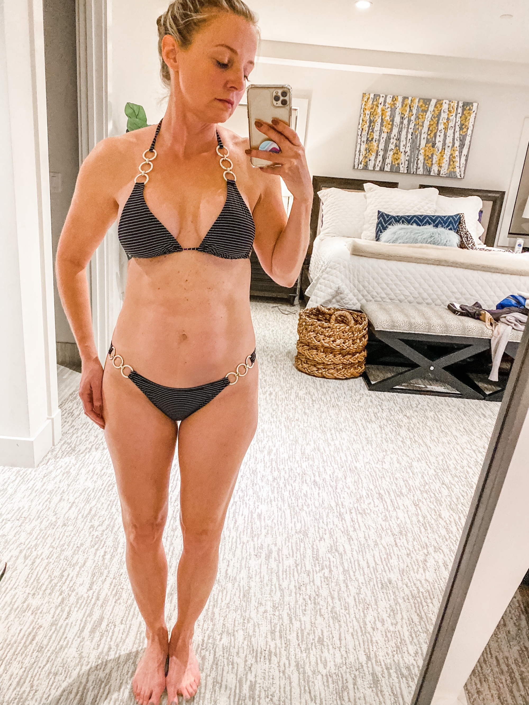 woman over 40 in black bikini about 15 pounds overweight