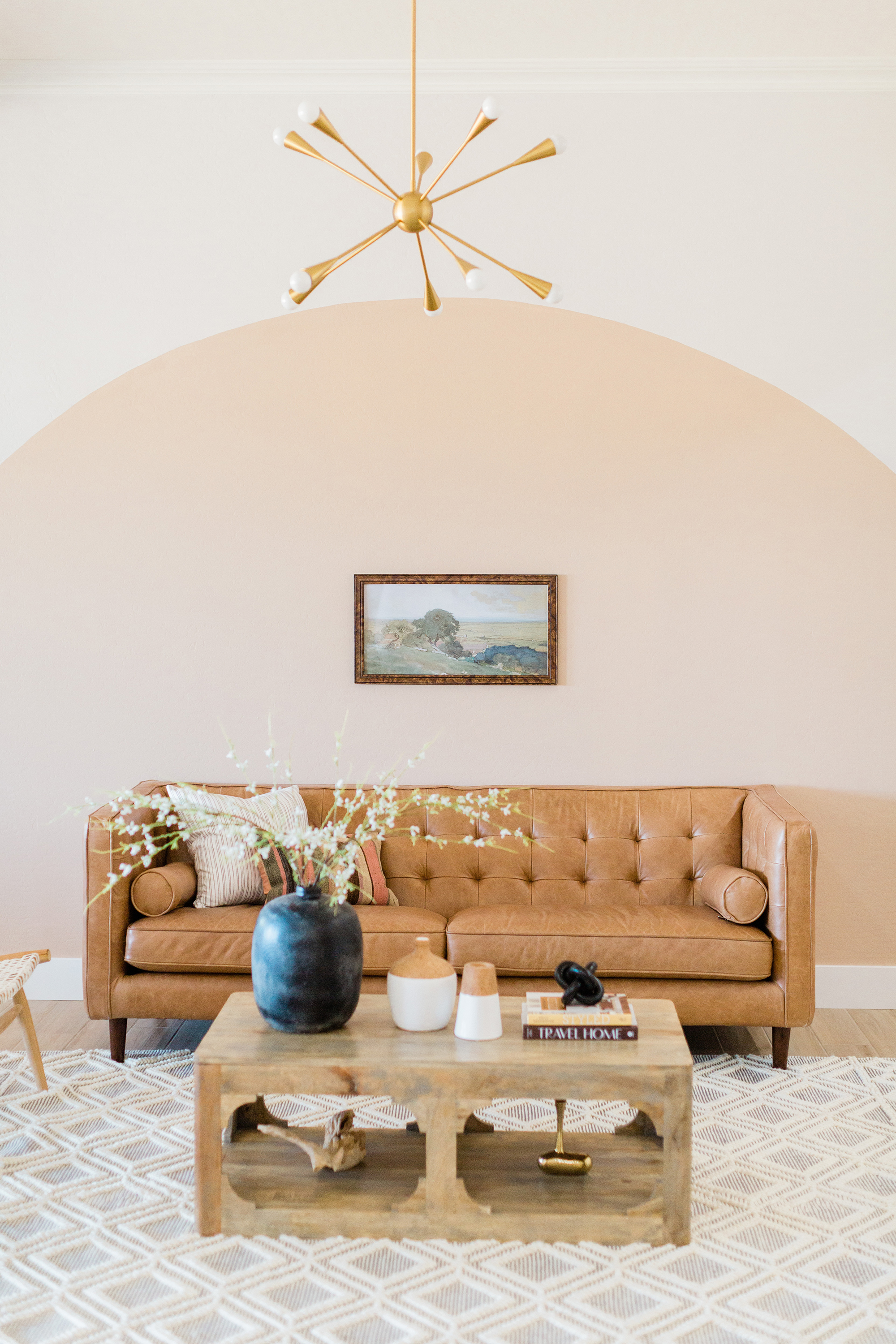 How To Update Your Home By Avoiding These 3 Décor Mistakes! Beautiful room with inviting whiskey brown leather couch and updated furniture