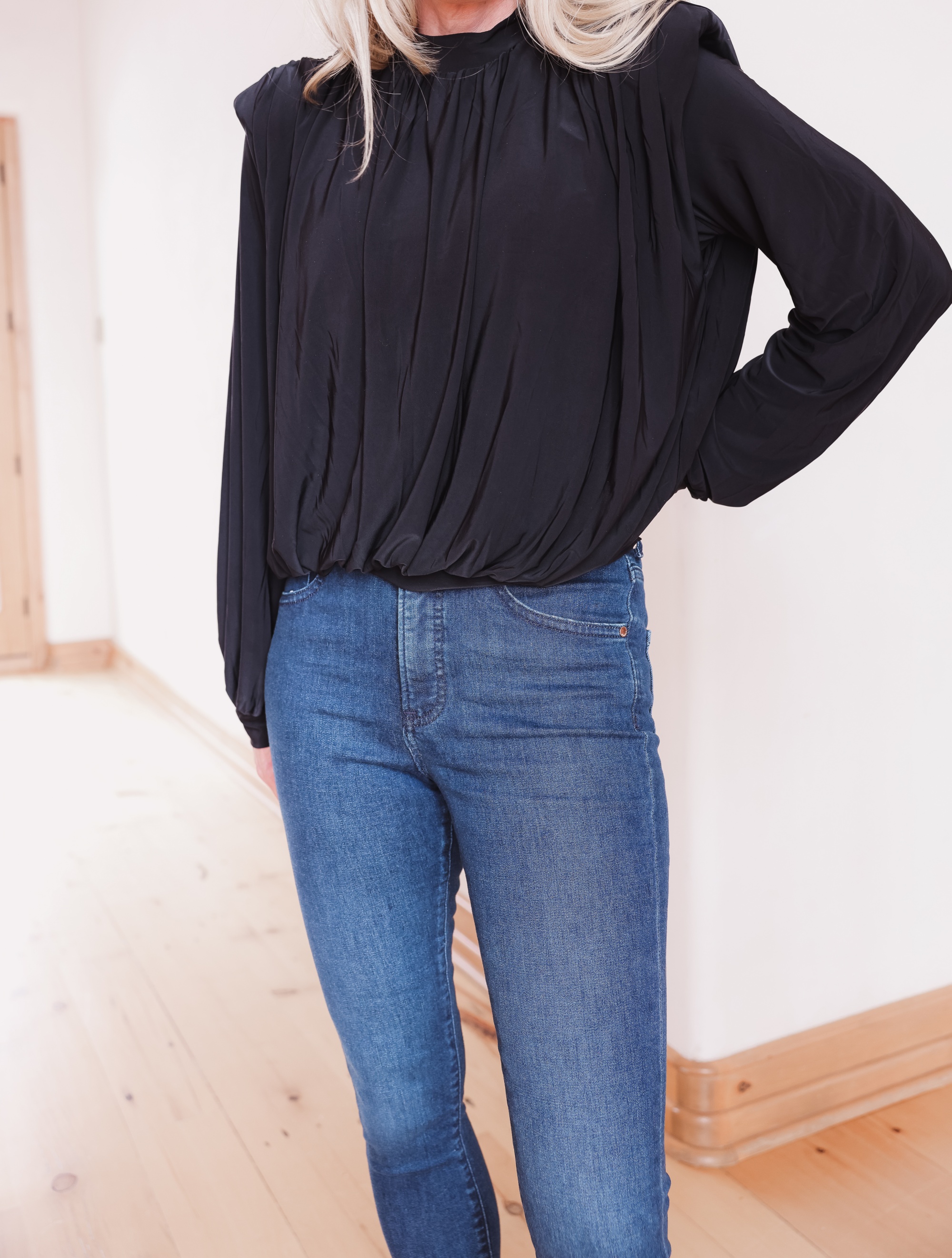 t-shirt trend, padded shoulder top, express padded shoulder blouse, erin busbee, black slouchy booties, high rise jeans, express denim