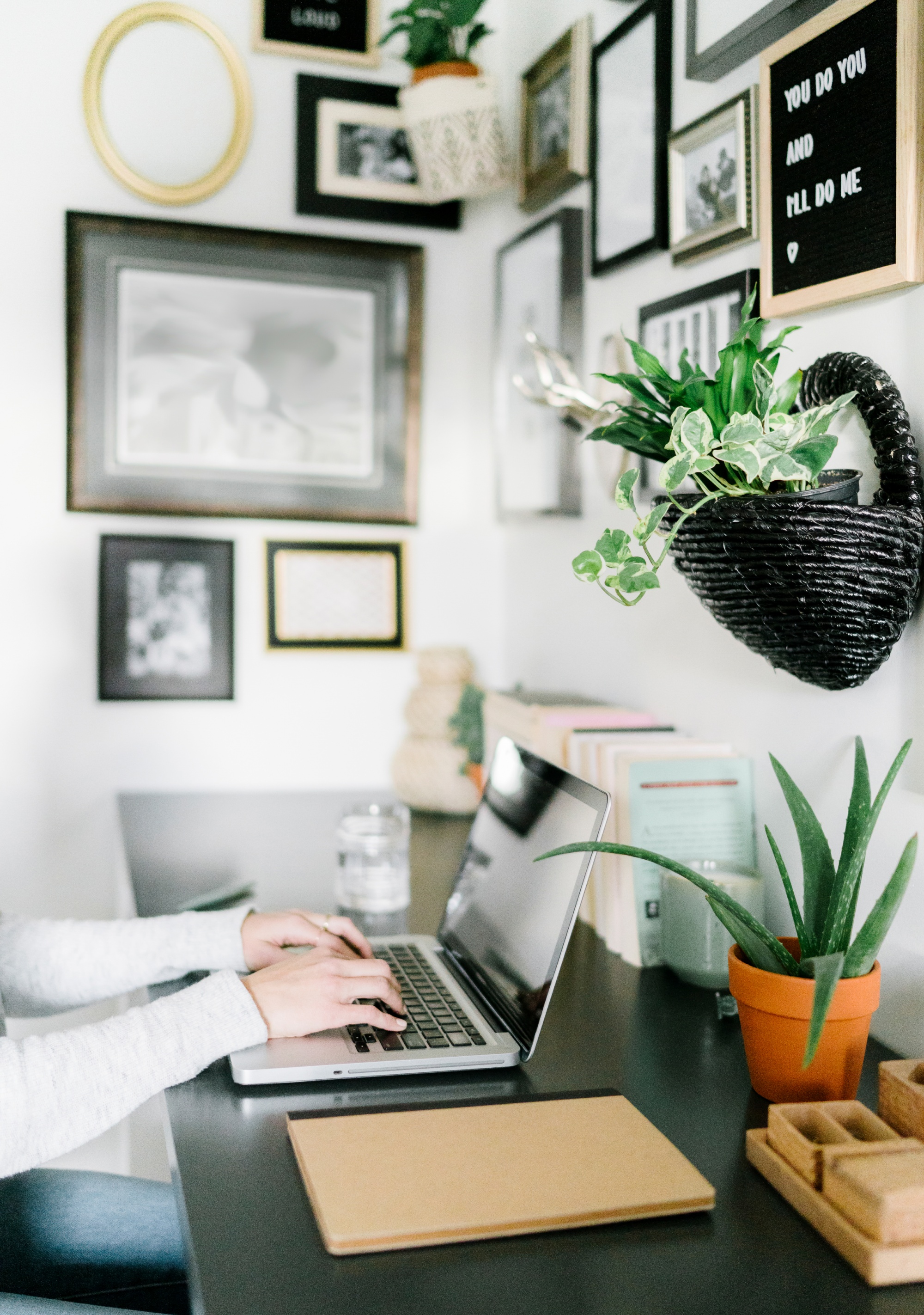 Why The Cloffice is the Best Work From Home Setup small desk with woman typing on keyboard