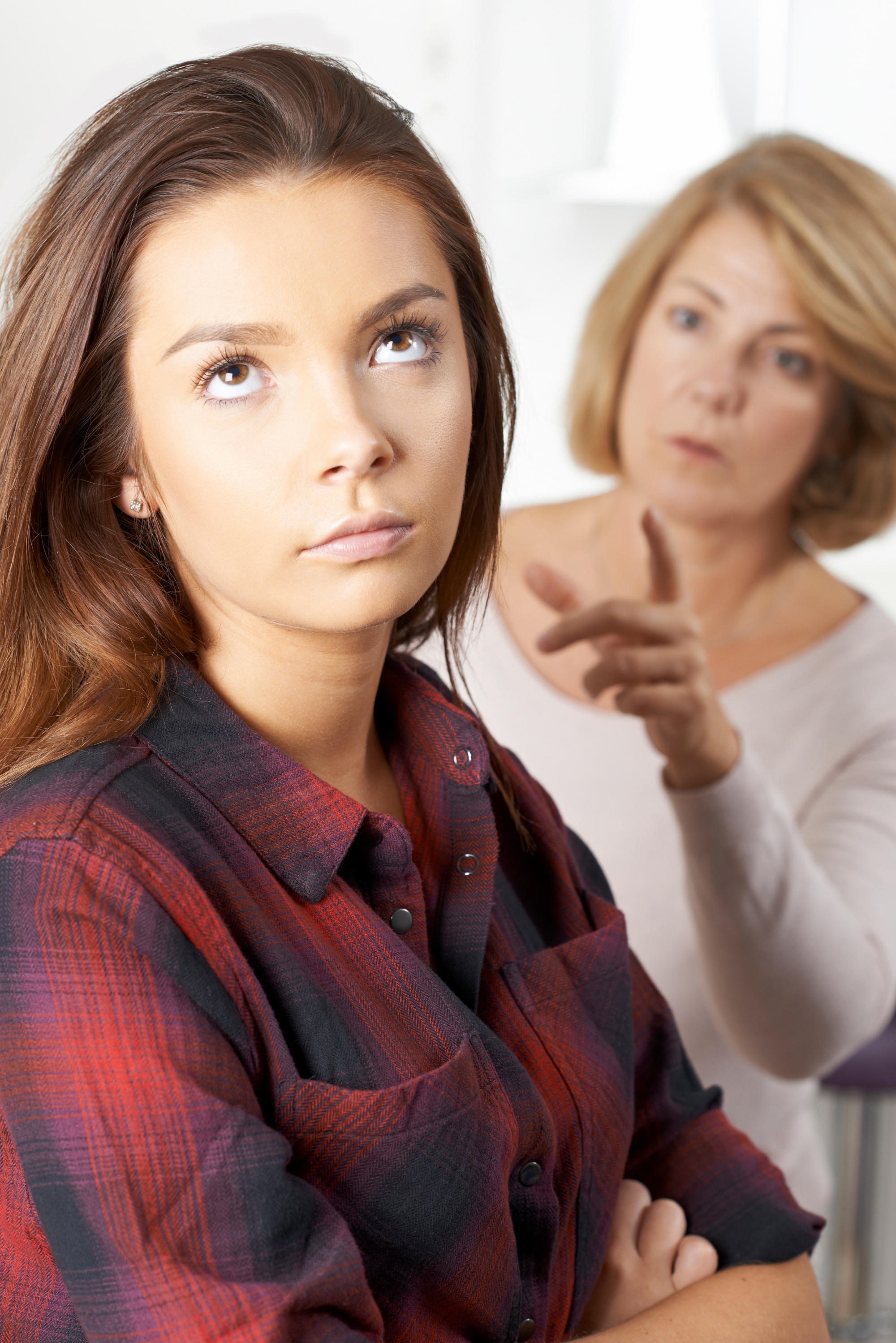 life with a teenage girl, teen girl ignoring and rolling her eyes at mom