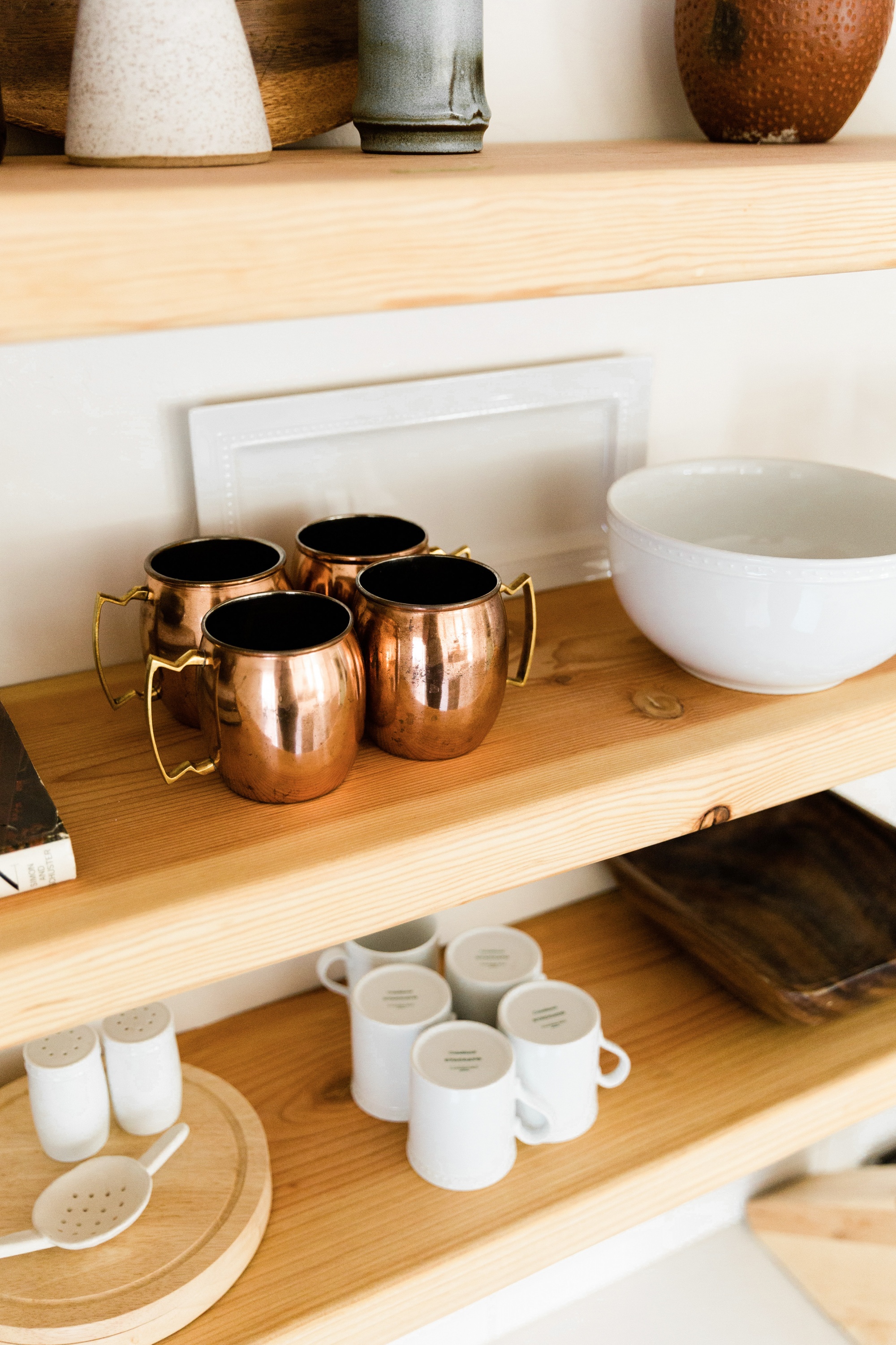 How To Style Pinterest-Worthy Floating Kitchen Shelves mugs and bowls on a shelf