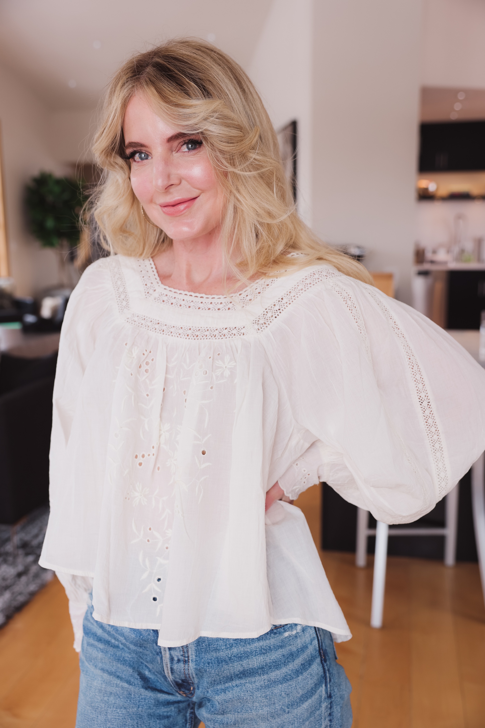 fashion over 40 blogger Erin Busbee of Busbee Style wearing white square neck eyelet cotton Free People peasant blouse with jean shorts by Moussy Vintage, march best sellers, favorites over 40, white free people blouse