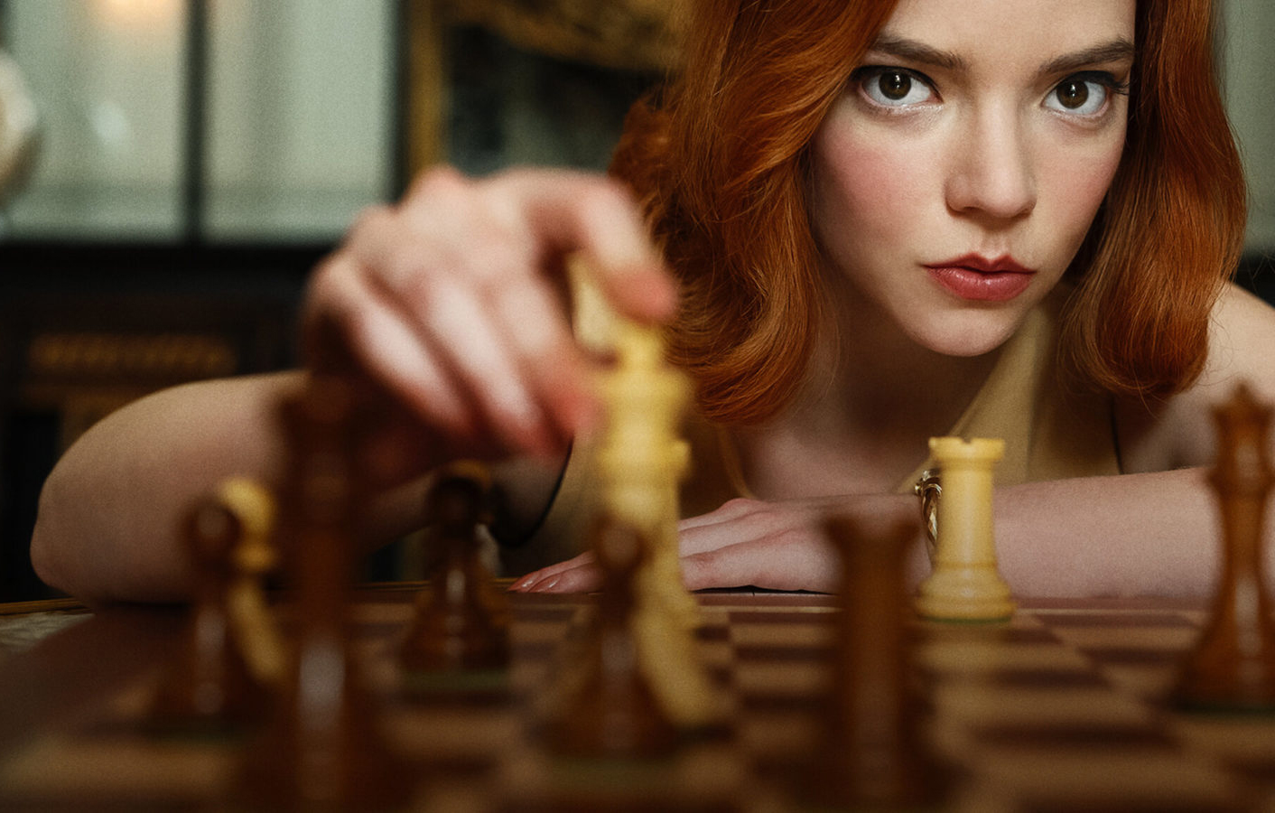 binge watch with your teens, The Queen’s Gambit, Netflix, pretty redhead woman playing chess