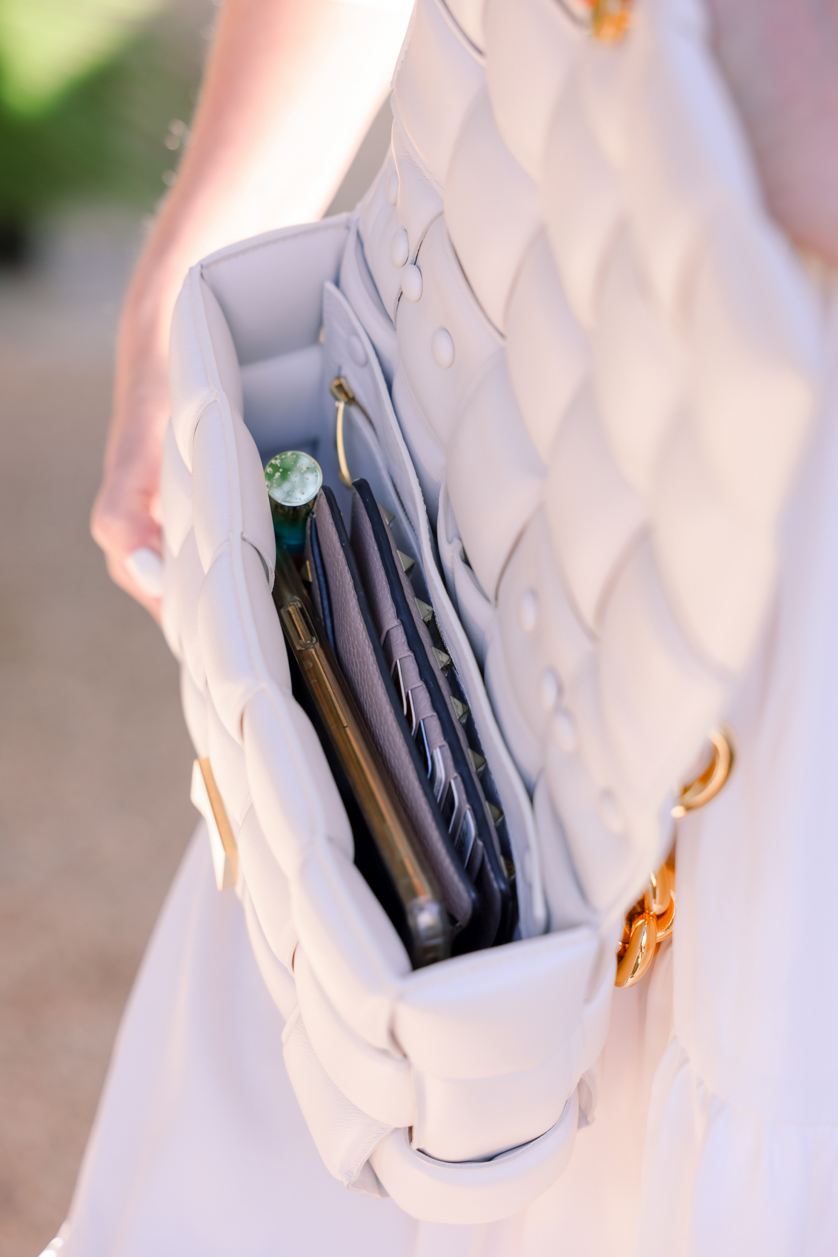 Honest review of Bottega Veneta Cassette Bag in White on fashion blogger over 40 Erin Busbee 