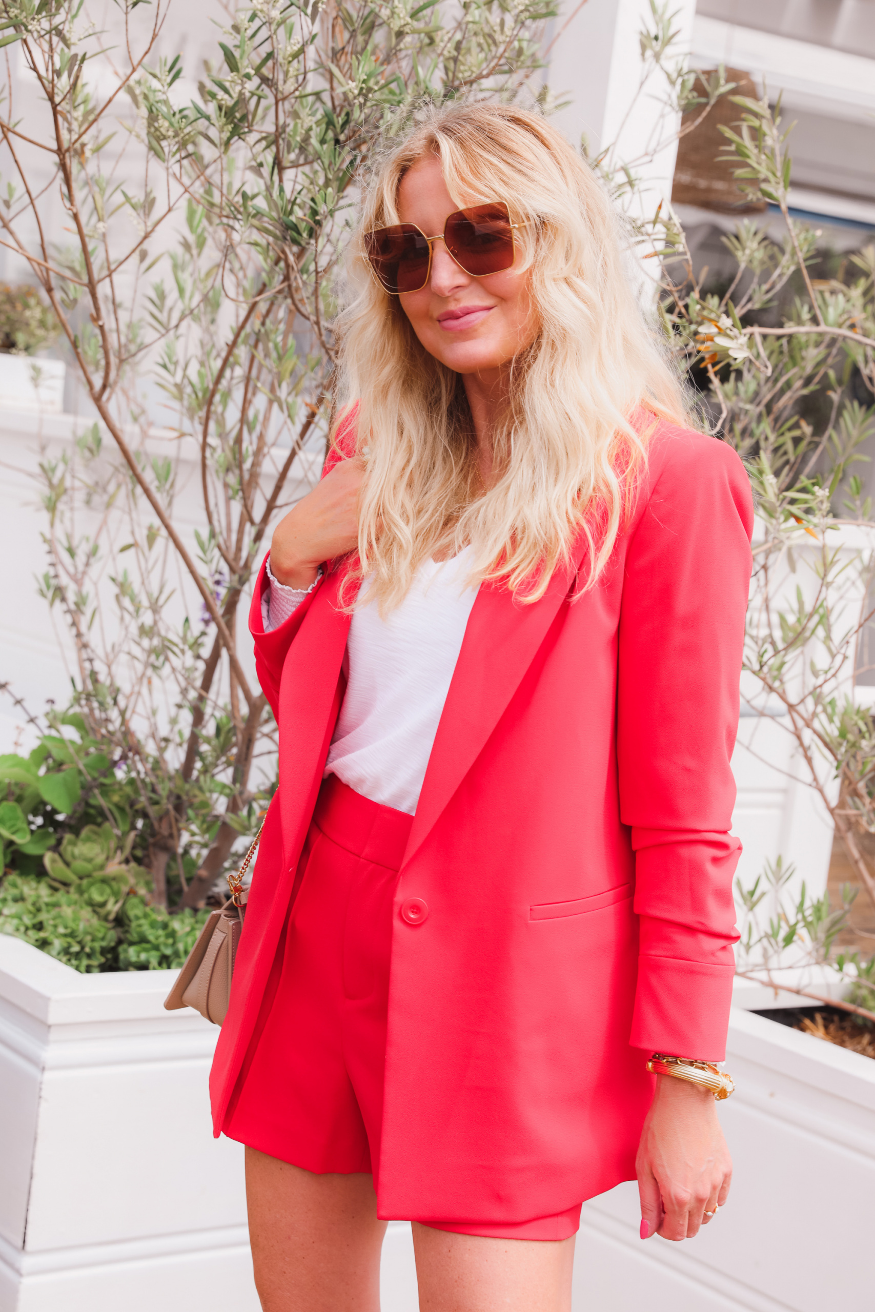 shorts suit in red by Alice + Olivia on fashion over 40 blogger Erin Busbee in Malibu California 