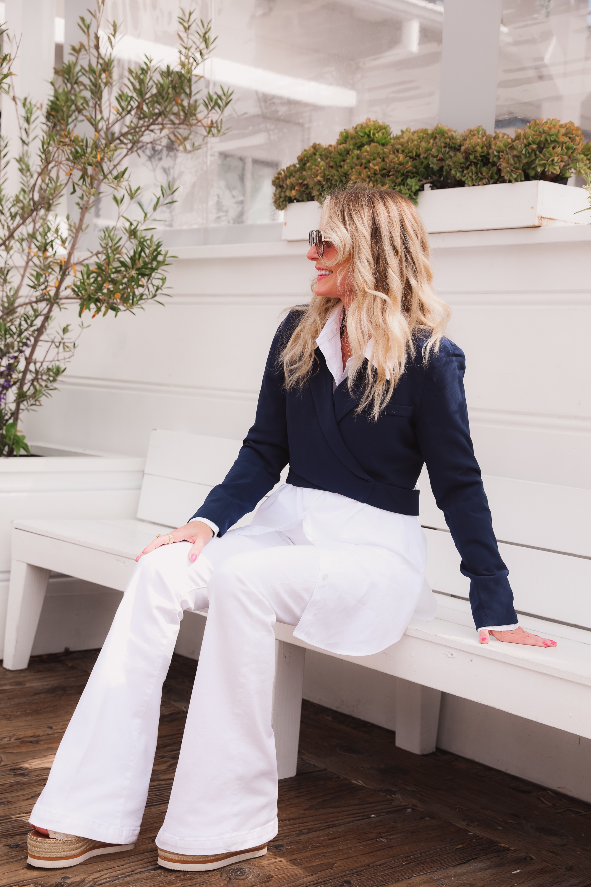 how to wear a cropped blazer, how to wear a cropped blazer over 40, how to wear cropped blazer, wear cropped blazer, navy cropped blazer, 4th & reckless cropped blazer, white open edit oversized button down, see by chloe wedges, white frame flare jeans, cropped blazer outfit, erin busbee