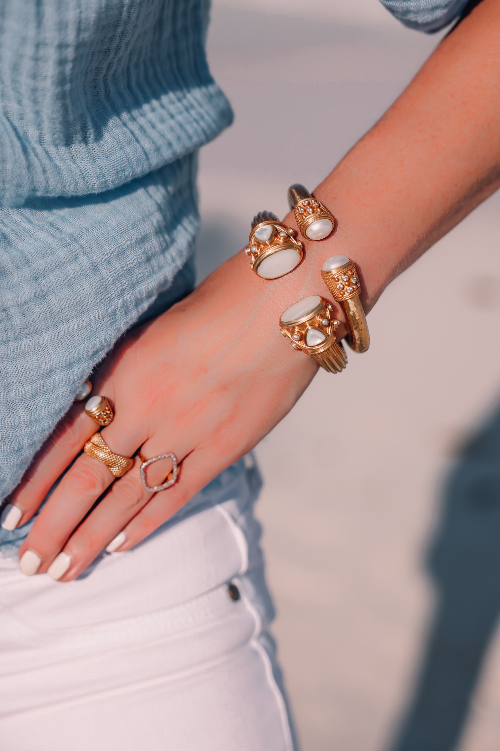 accessories for beach vacation featuring hinge bracelets by Julie Vos and rings by Monica Vinager