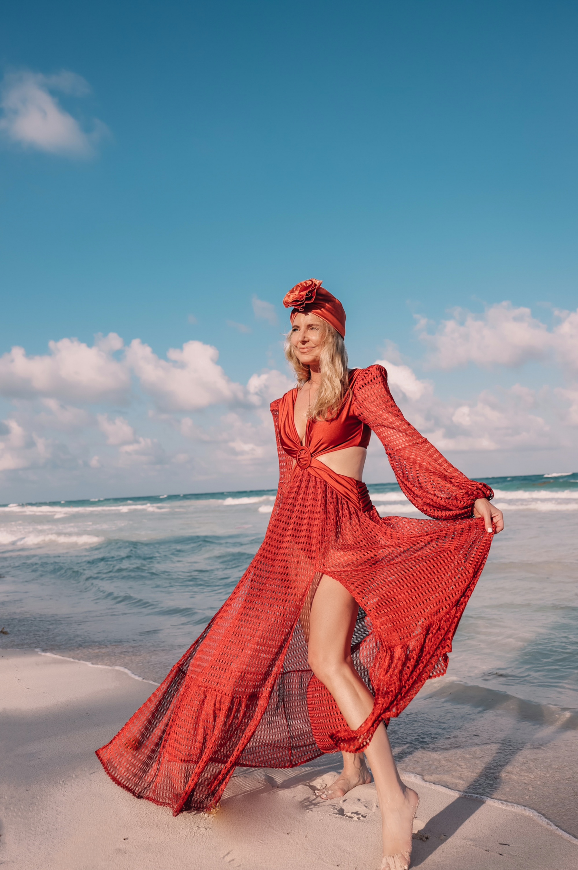 maxi dress by Patbo for the beach in crochet fabric and rust color in Tulum Mexico on fashion over 40 blogger Erin Busbee, maxi dresses, killer maxi dresses, sexy maxi dresses