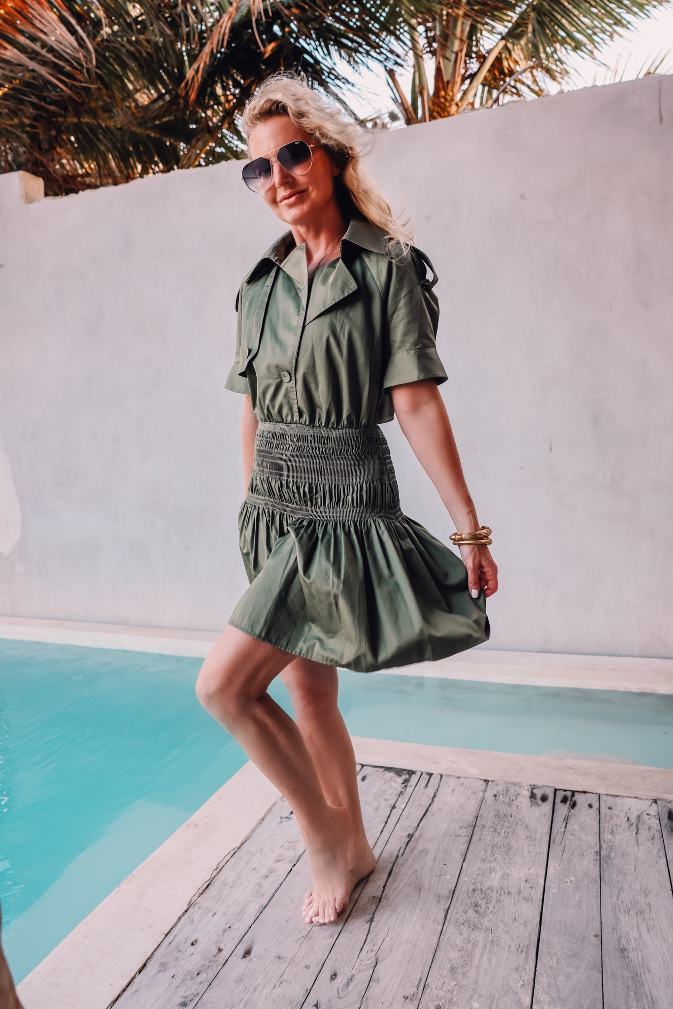 dark green self-portrait trench dress with smocking on fashion over 40 blogger Erin Busbee in Mexico