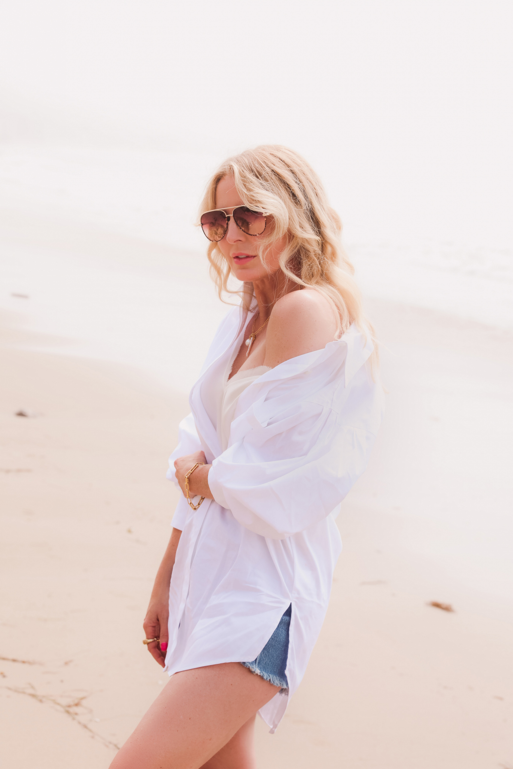 best white button down shirts, button down shorts over 40, how to find the perfect button dow shirt, white button down shirt, erin busbee, open edit oversized white button down shirt, why own a white button down shirt, levi's denim shorts, see by chloe espadrilles